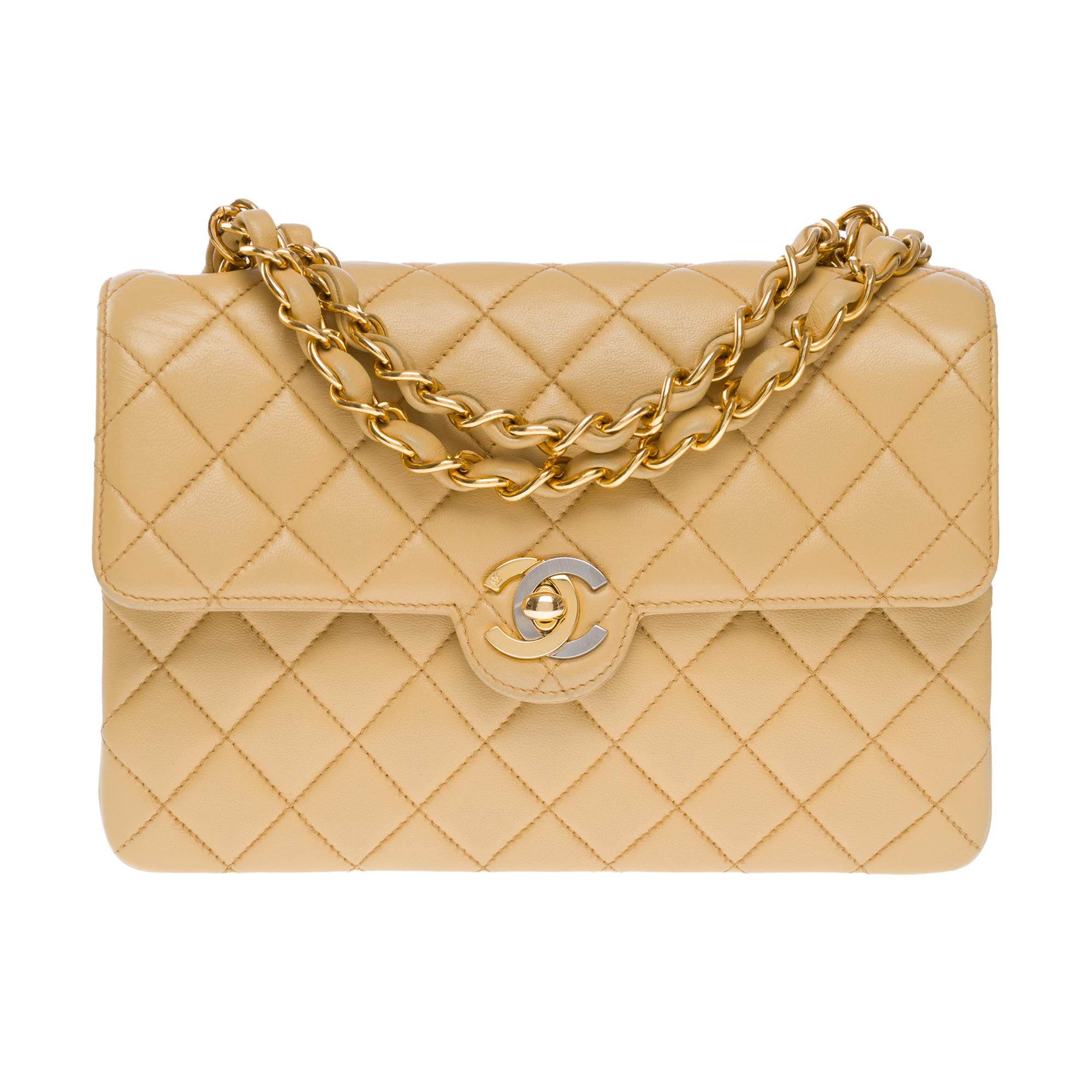 Beautiful​ ​Chanel​ ​Timeless​ ​Mini​ ​shoulder​ ​flap​ ​bag​ ​in​ ​beige​ ​quilted​ ​lambskin,​ ​shoulder​ ​strap​ ​in​ ​golden​ ​metal​ ​interlaced​ ​with​ ​beige​ ​lambskin​ ​leather​ ​for​ ​a​ ​hand​ ​or​ ​shoulder​ ​or​ ​crossbody​