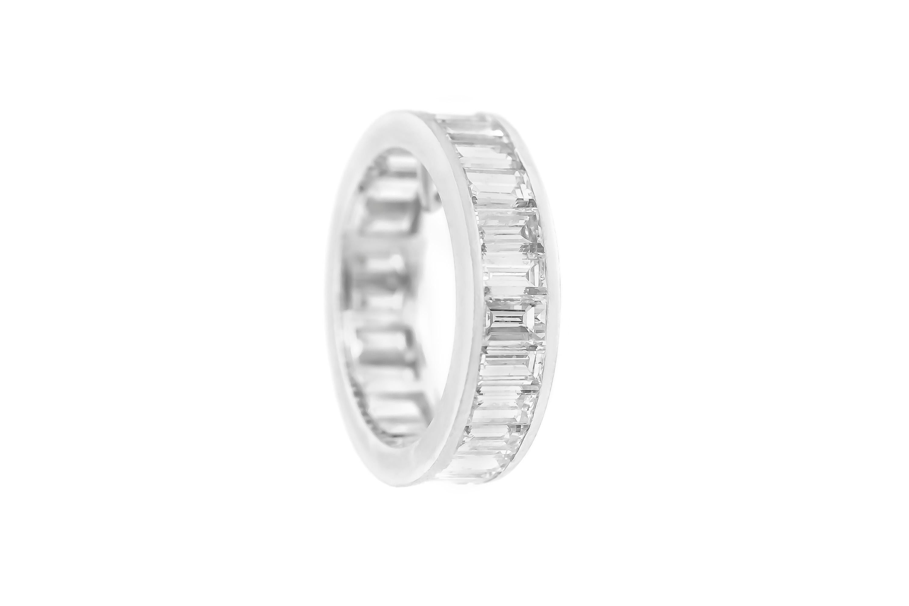 The ring is finely crafted in platinum with diamonds weighing approximately total of 4.00.
