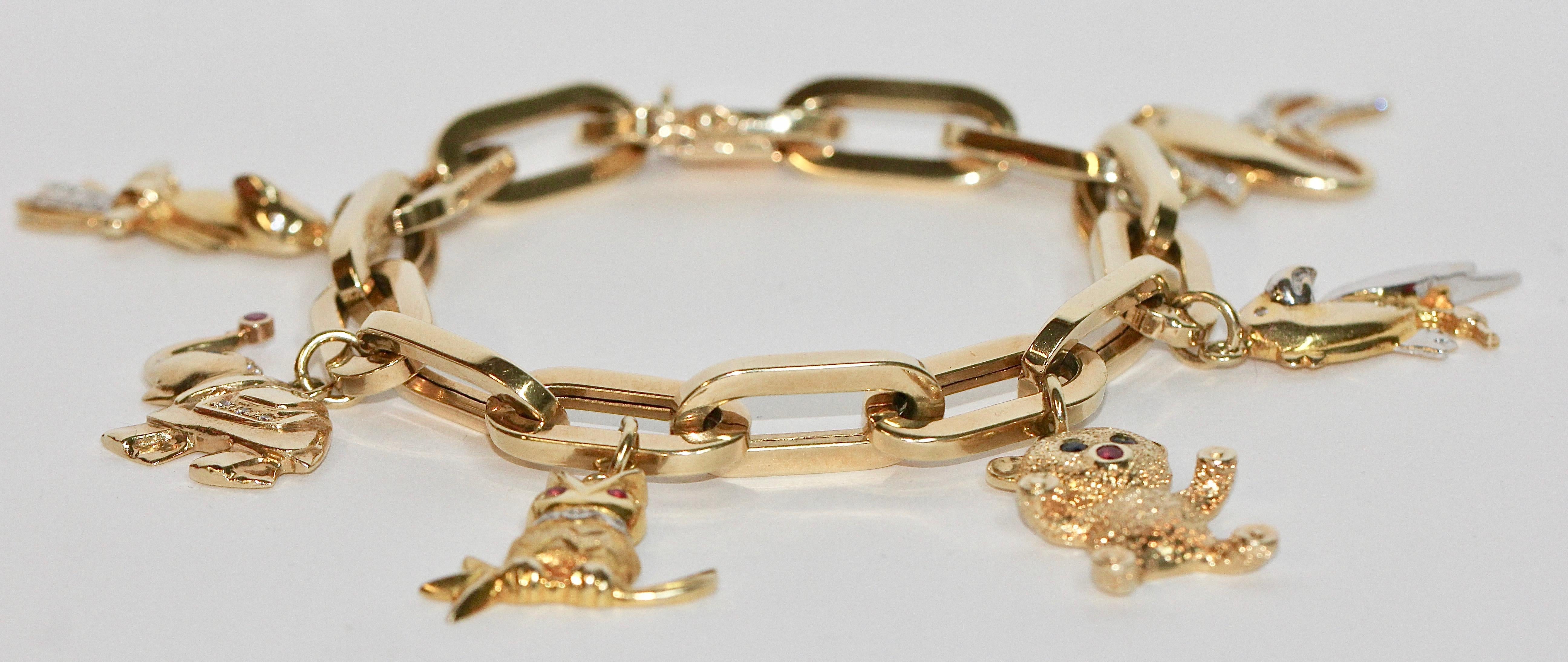 Beautiful Charm Bracelet with Six Pendants, 14k Solid Gold, Diamonds, Sapphires In Excellent Condition In Berlin, DE