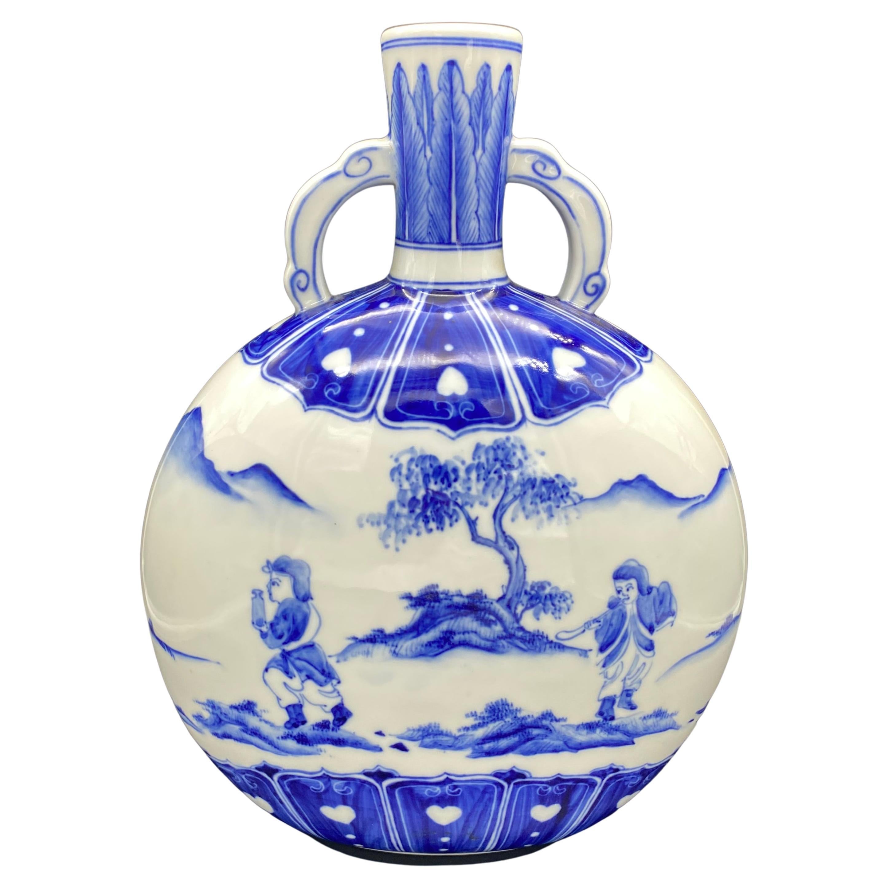 Magnifique vase gourde chinois en porcelaine blanche et bleue