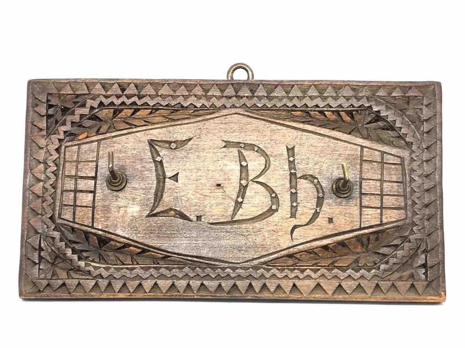 A lovely key hanger board made of hand carved wood, made in the black forest area in Germany. Found at an estate sale in Nuremberg, Germany. It is not marked. A nice addition to your collection. It is in very good as found condition. Metal with a