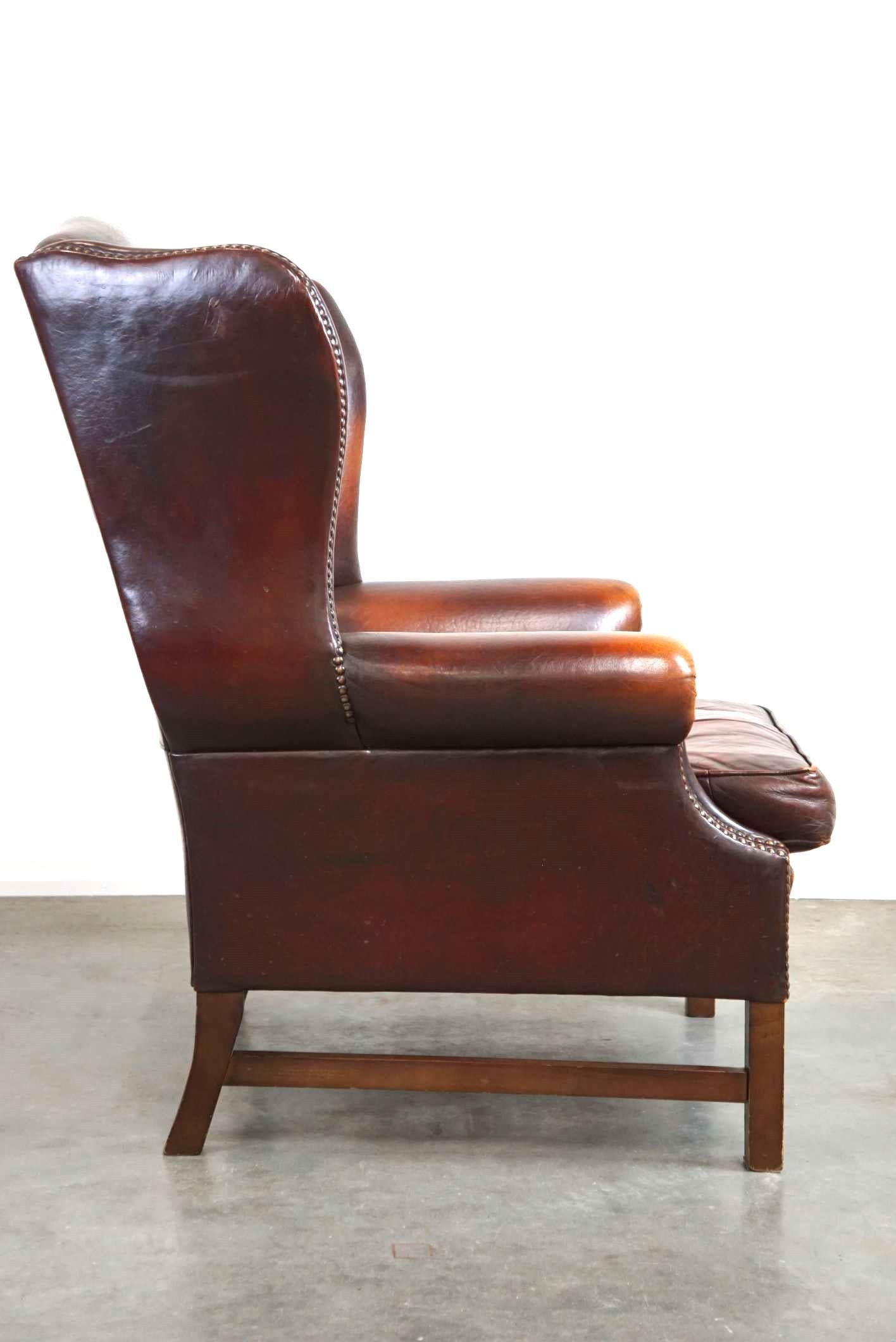 Beautiful Classic and Stately Wingback Armchair Made of Sheepskin Leather In Good Condition For Sale In Harderwijk, NL