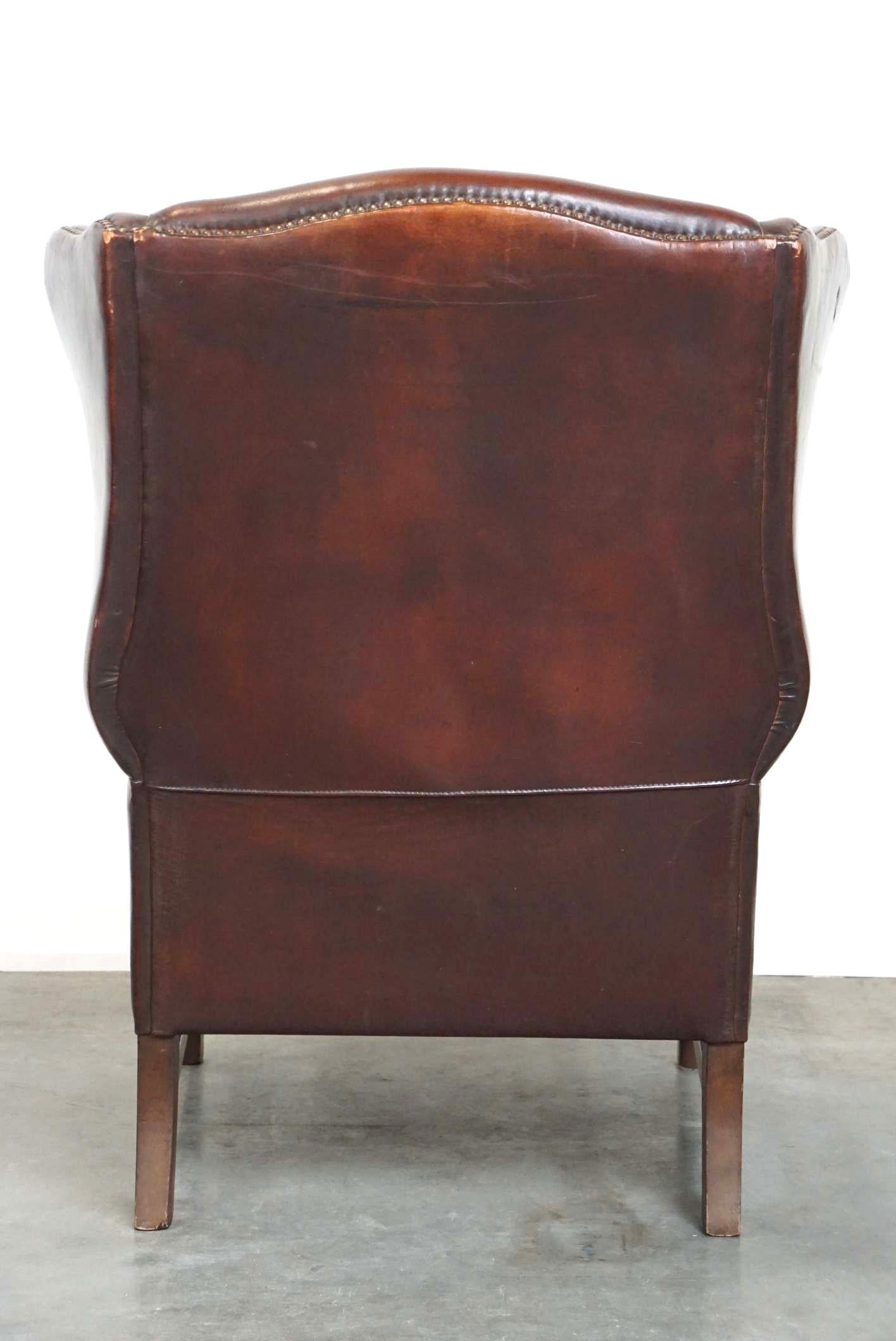 20th Century Beautiful Classic and Stately Wingback Armchair Made of Sheepskin Leather For Sale