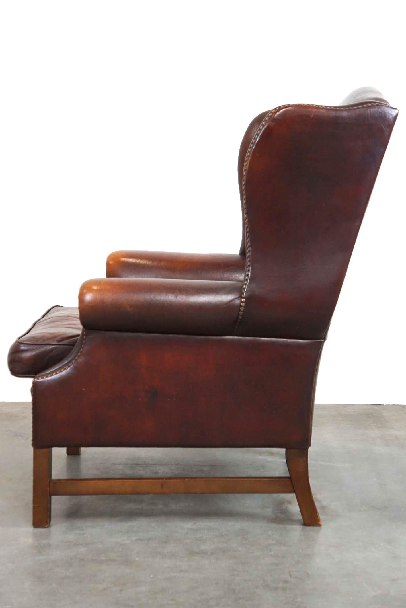 Beautiful Classic and Stately Wingback Armchair Made of Sheepskin Leather For Sale 1