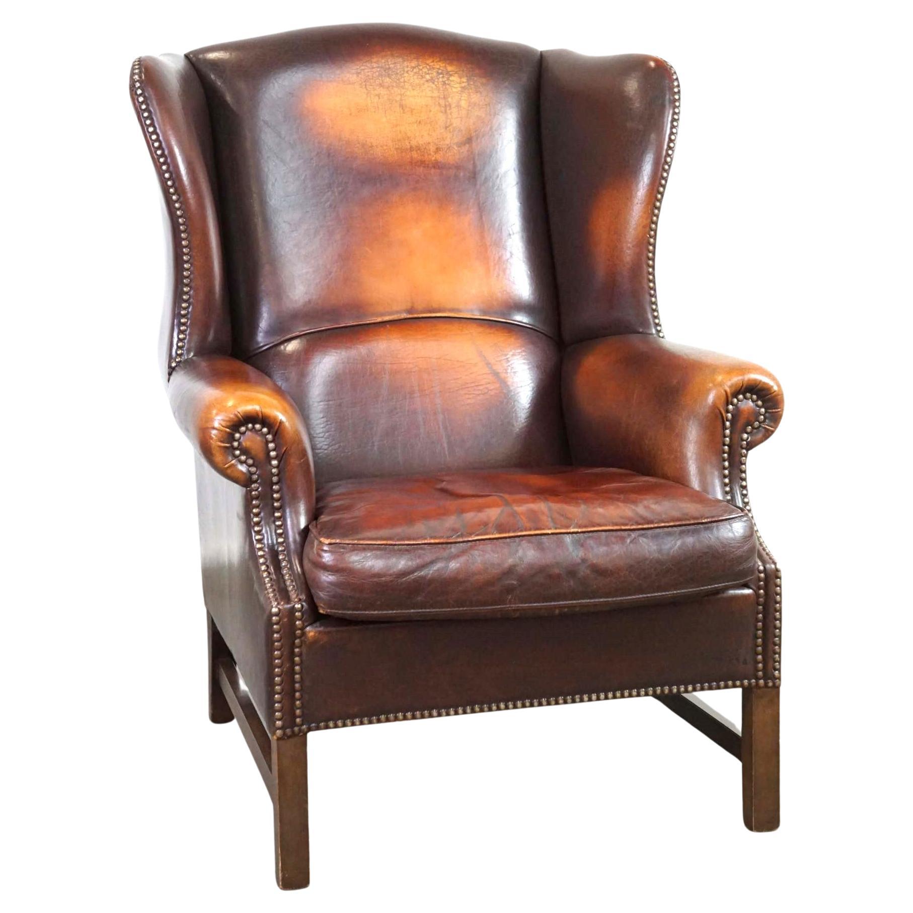 Beautiful Classic and Stately Wingback Armchair Made of Sheepskin Leather For Sale