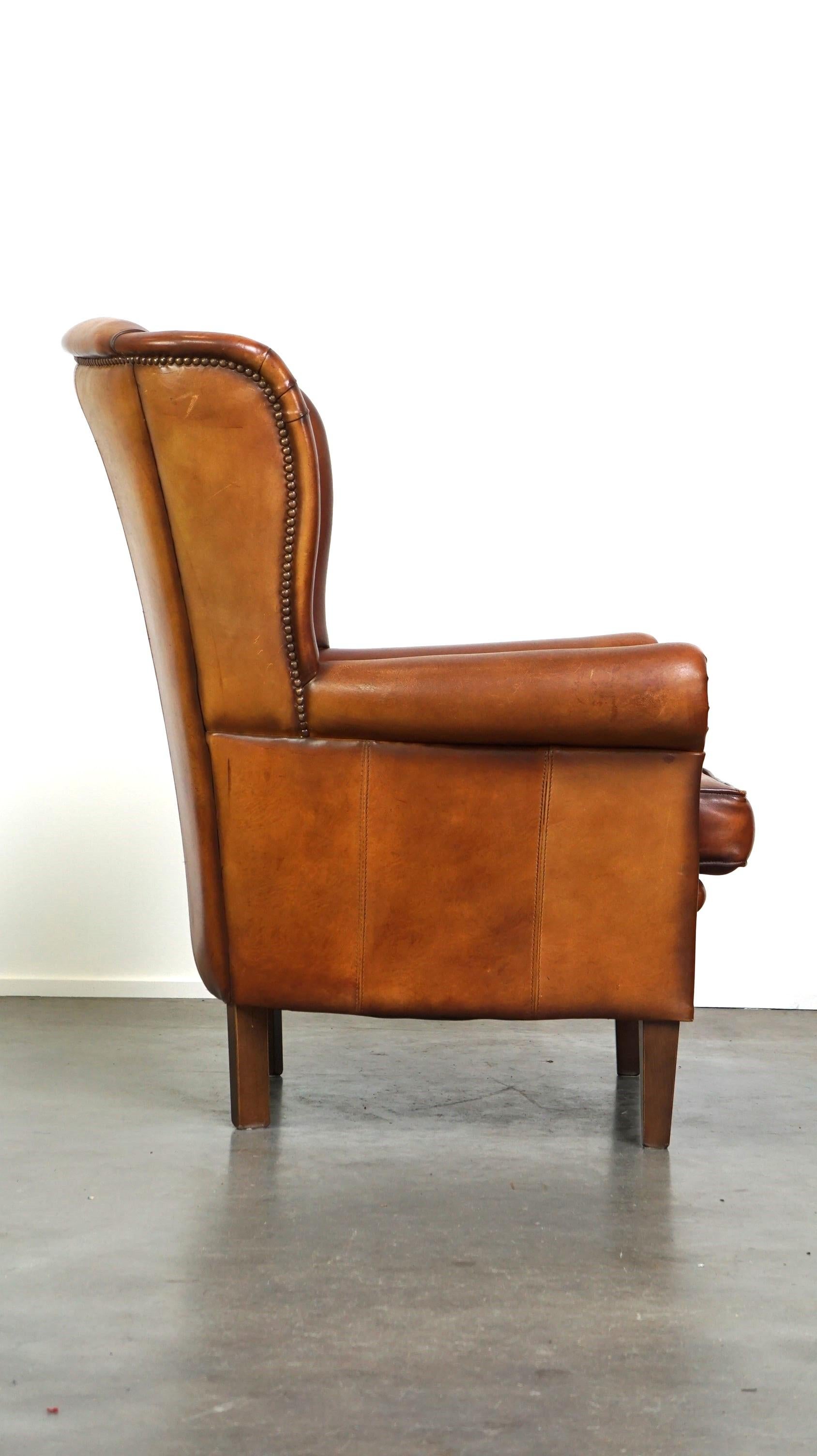 Dutch Beautiful classic sheepskin armchair with a beautiful appearance For Sale