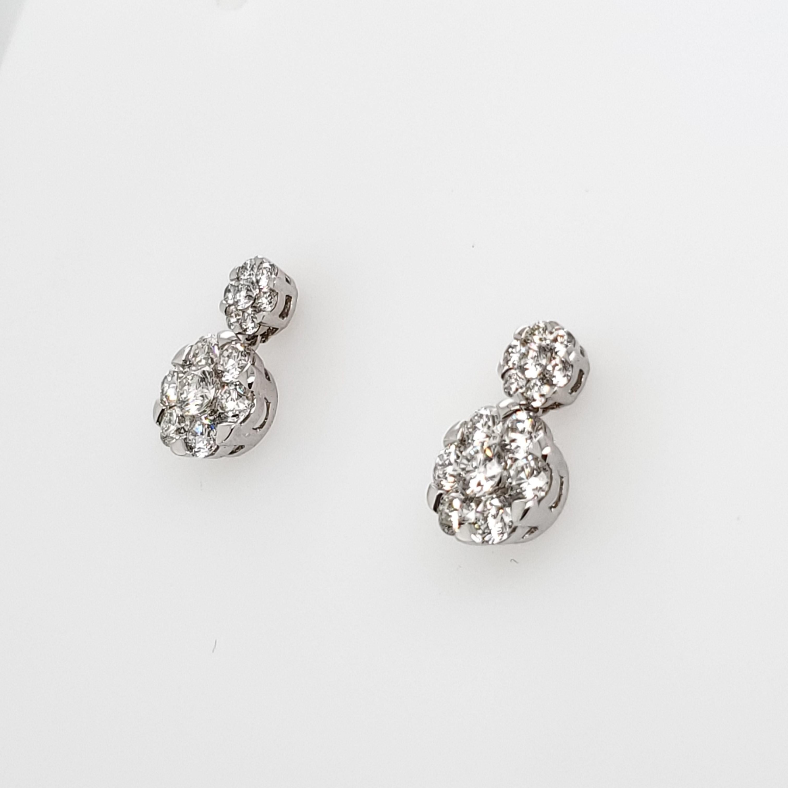 Beautiful Cluster Flower Dangle Diamond Earrings in 18K White Gold
Round Brilliant Cut Diamond total Carat Weight 1.97 ct G-H Color and SI Clarity
Ready to be shipped today