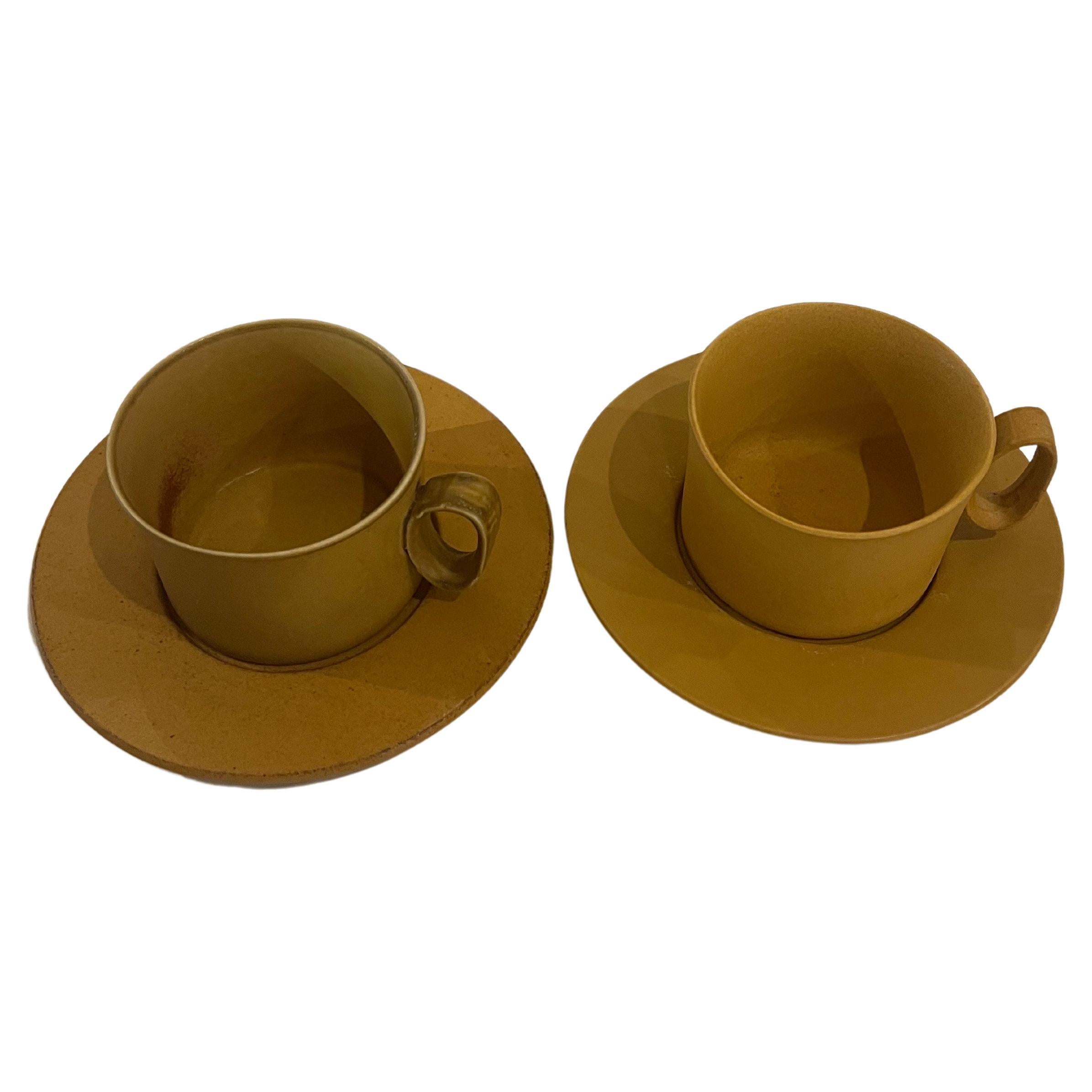 Beautiful pair elegant set of coffee cups and saucers by Bennington pottery , circa 1950's beautiful color and condition no chips or cracks , elegant and hard to find great for coffee and capuccinos.
