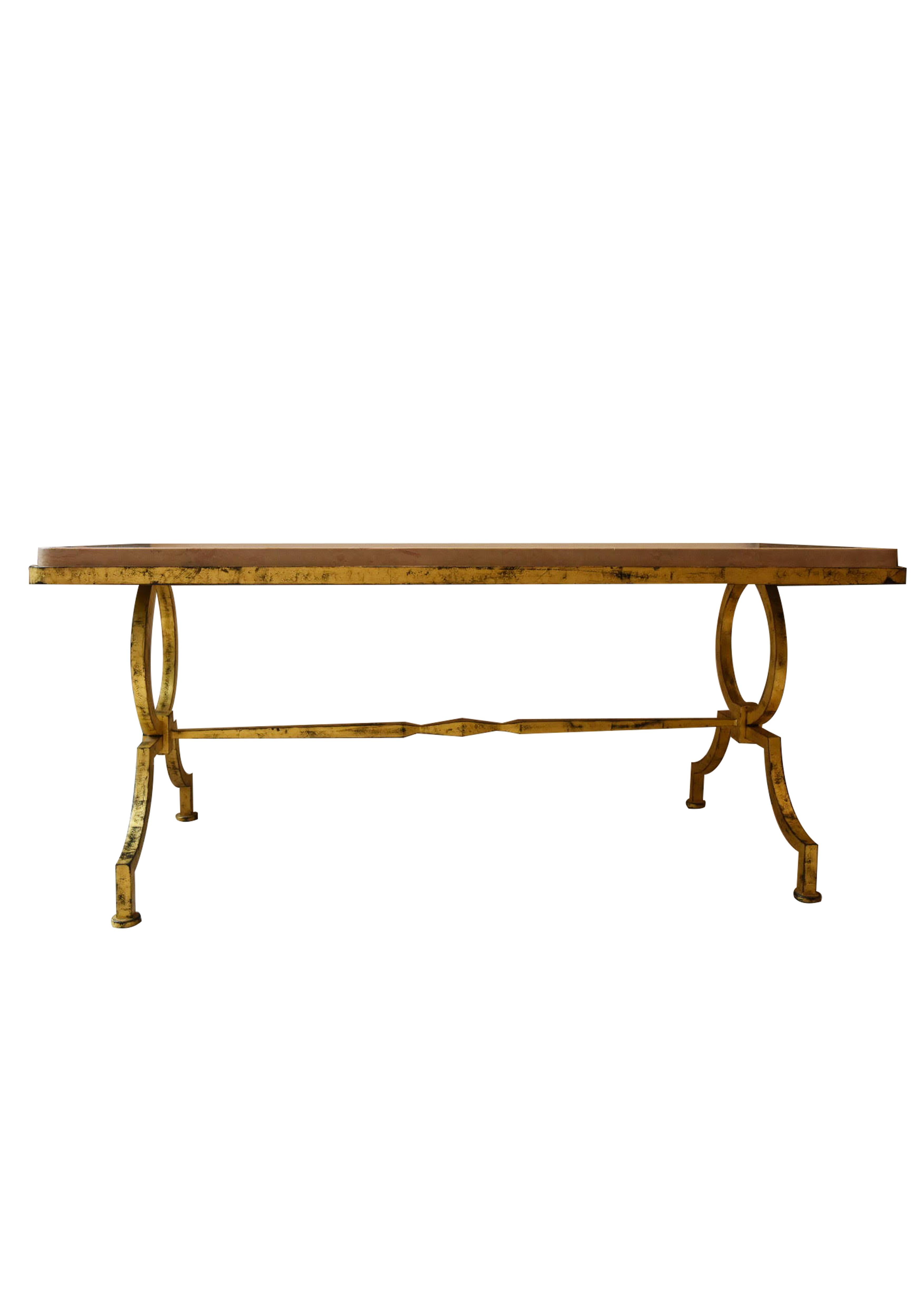 Beautiful coffee table by Jacques Adnet for Gilbert Poillerat. 
Gilded wrought iron legs, original comblanchien top resting on two uprights composed of a half circle and an arched foot.
 