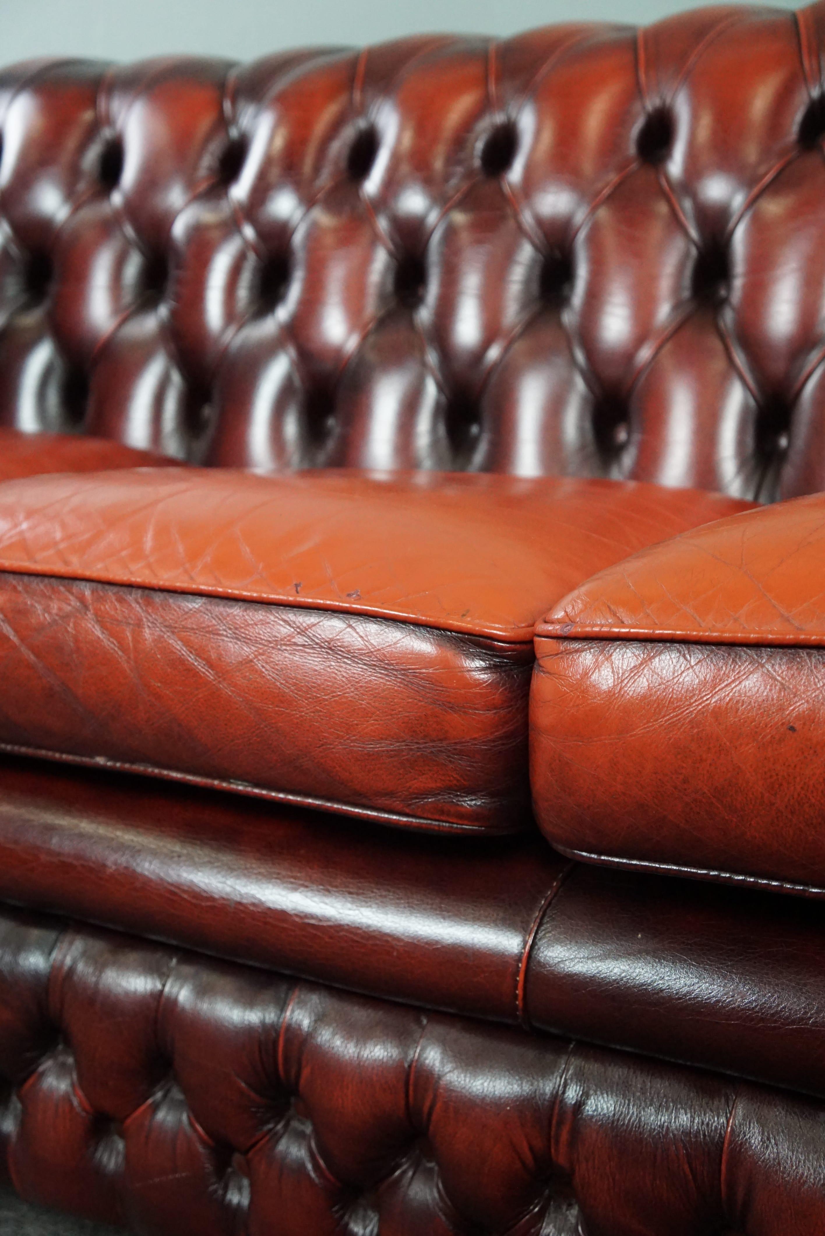 Beautiful colored red spacious cow leather Chesterfield sofa, 2.5 seater For Sale 1