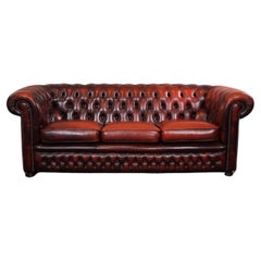 Beautiful colored red spacious cow leather Chesterfield sofa, 2.5 seater