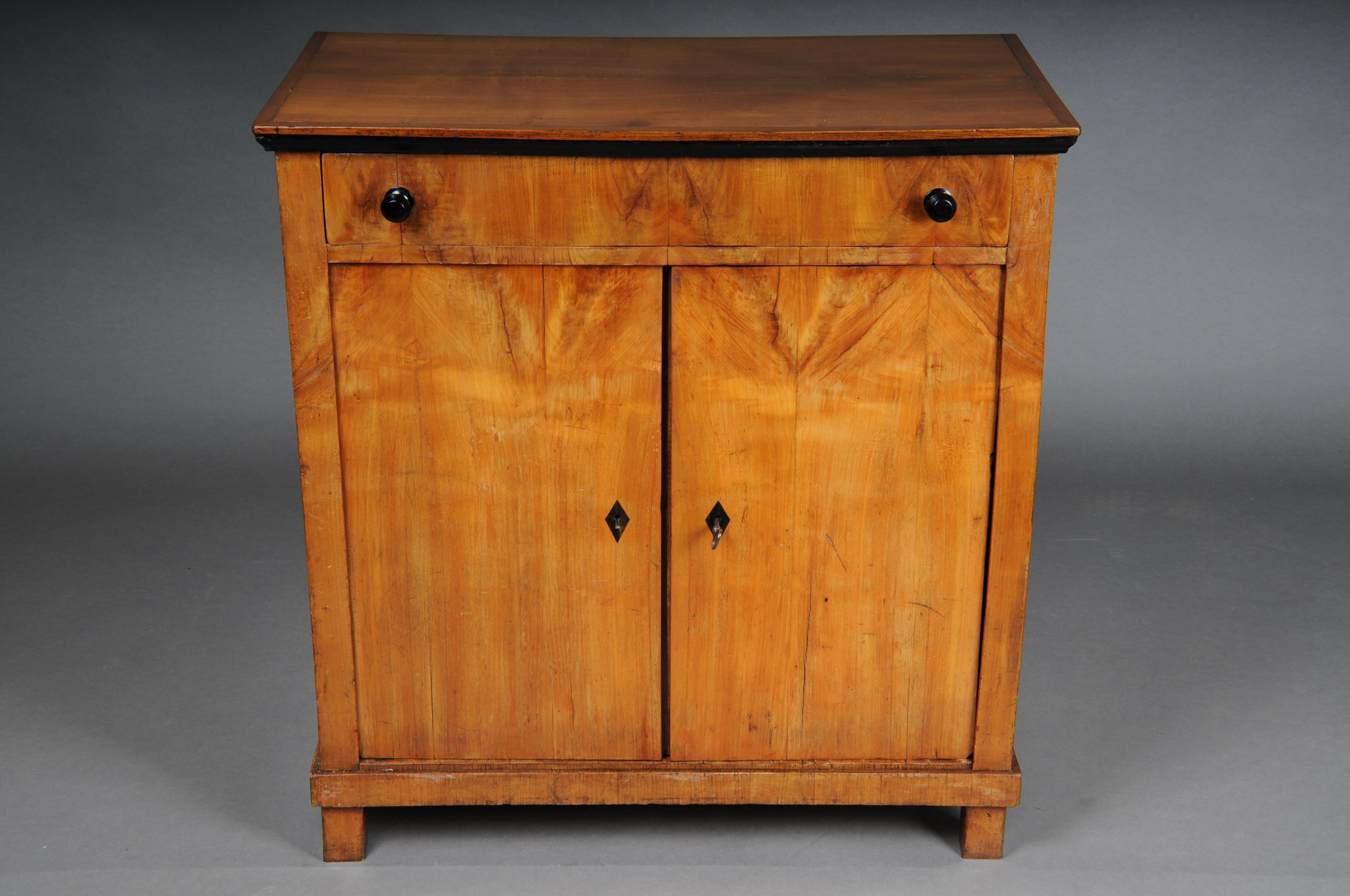 Beautiful compact Biedermeier chest of drawers, South German around 1840, birch


Solid birch body, partly ebonized. Drawer front with ebonized knobs. Lockable base cabinet with shelf. Lock and key available.

Biedermeier, South German around 1840