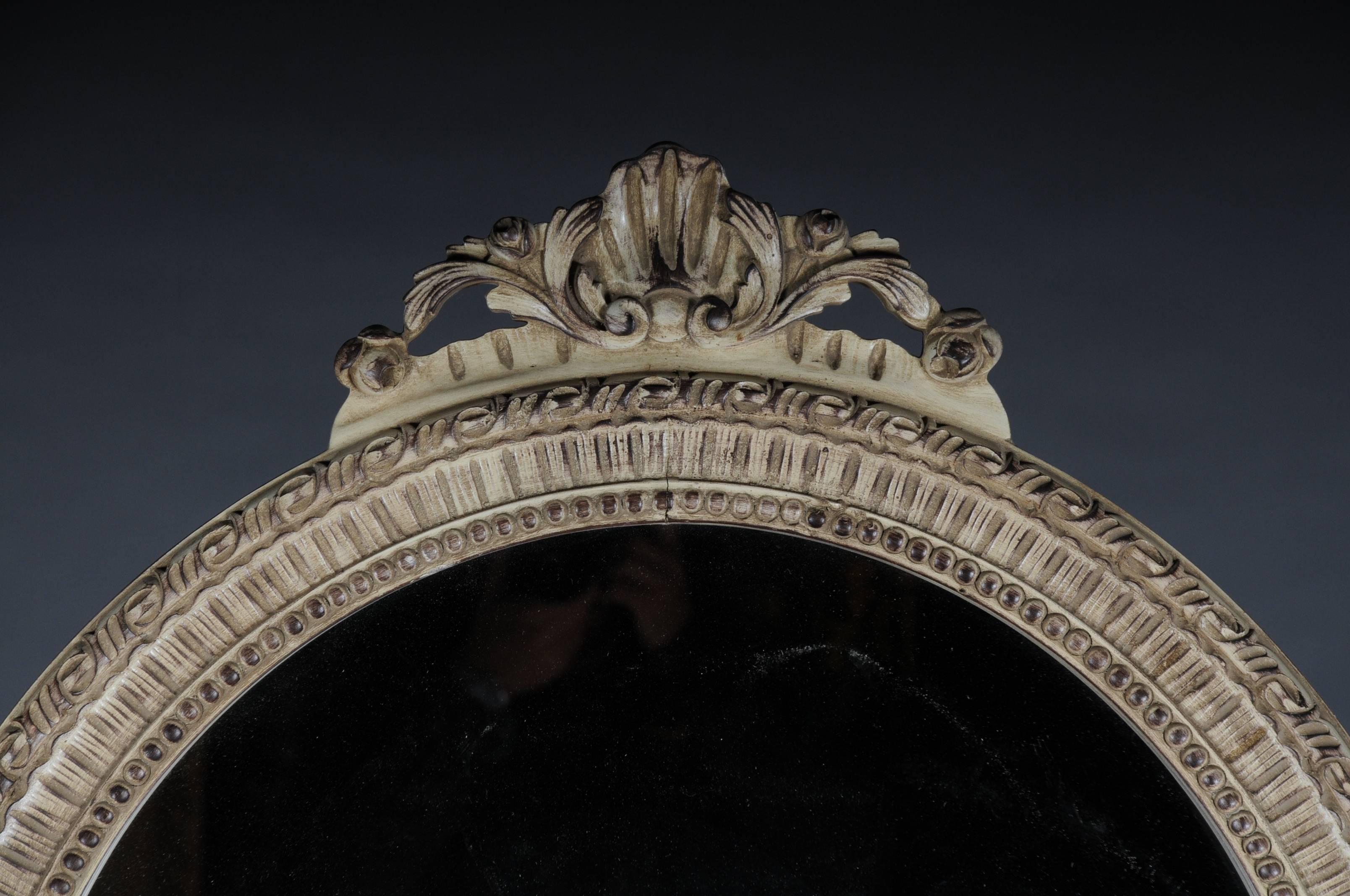 Solid beechwood, carved and painted. Semicircular high-rectangular body on conical, fluted legs. Cambered frame with surrounding carvings, inlaid marble top. High rectangular mirror frame with ornate carvings. Facetted mirror glass.


(M-Dom-44).