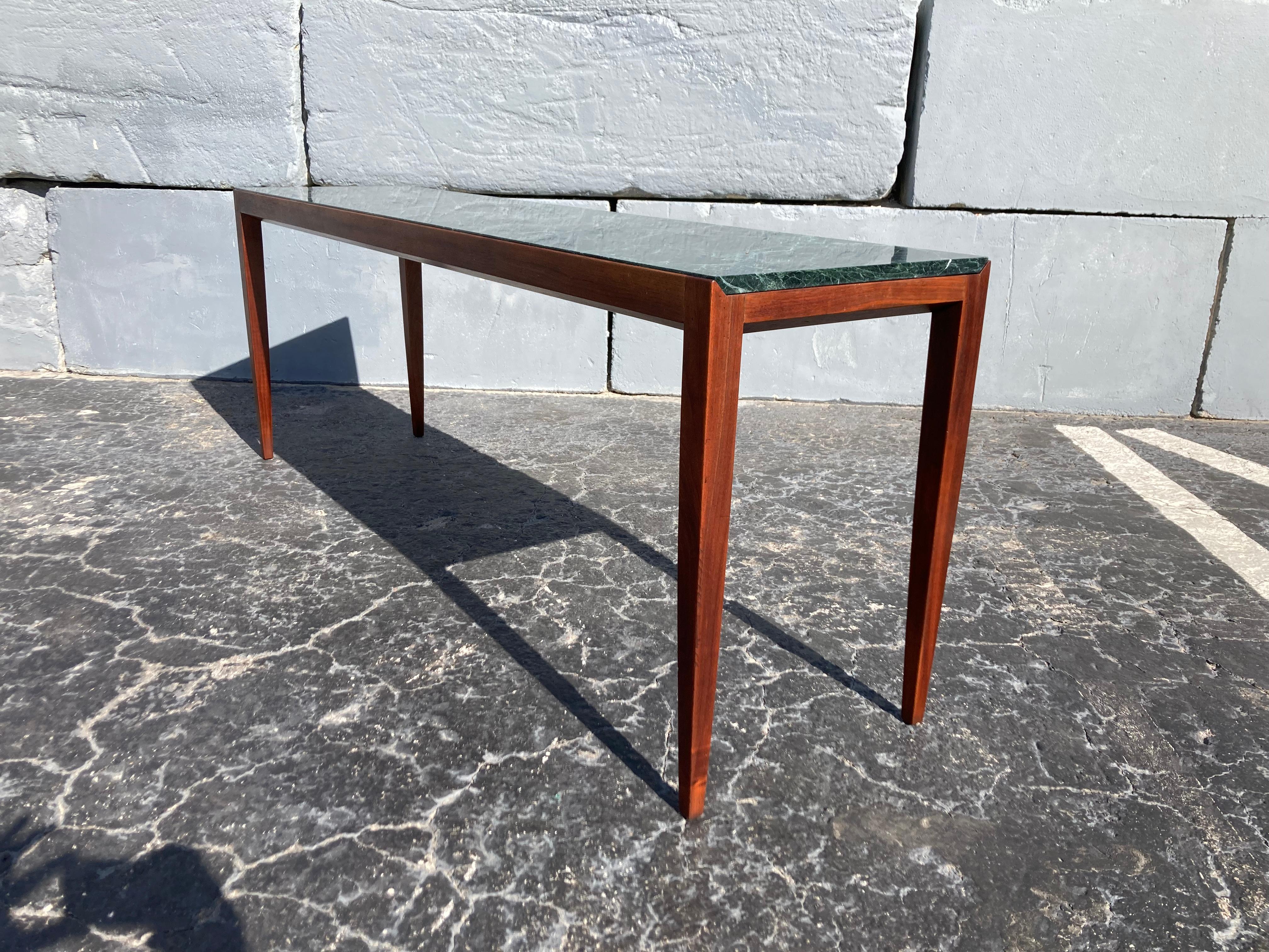 Stunning Console Table. Solid walnut base with marble top. Excellent craftsmanship.
