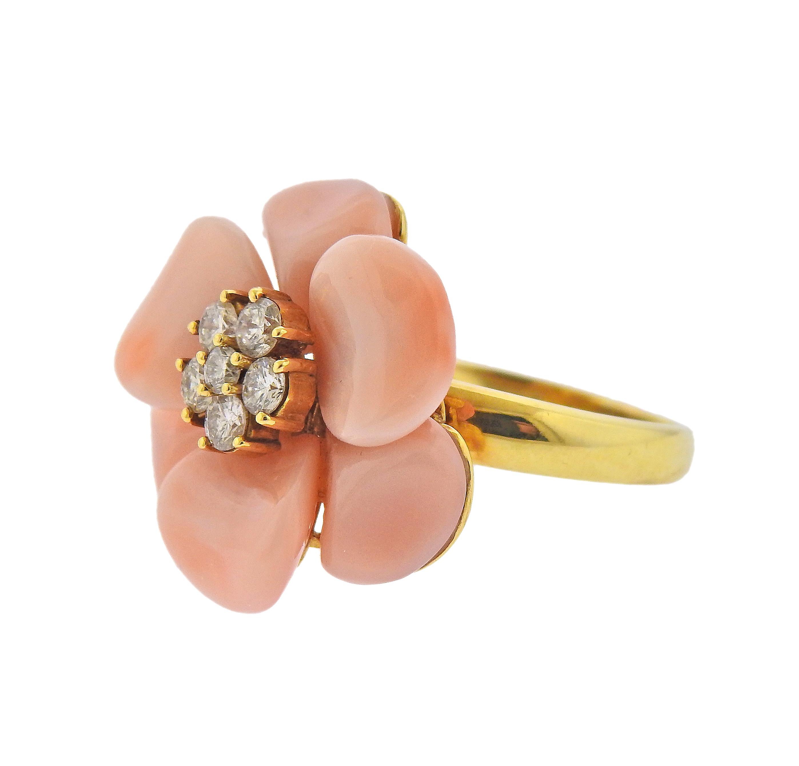 18k yellow gold flower ring, with coral petals and 0.56ctw in diamonds. Ring size - 7, ring top - 24mm x 22mm. Marked: 750, D056, k18. Weight - 10.7 grams. 