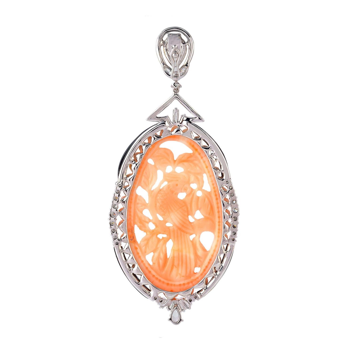 Mixed Cut Beautiful Coral Carved Bird Pendant with Diamonds around in 18 Karat White Gold For Sale