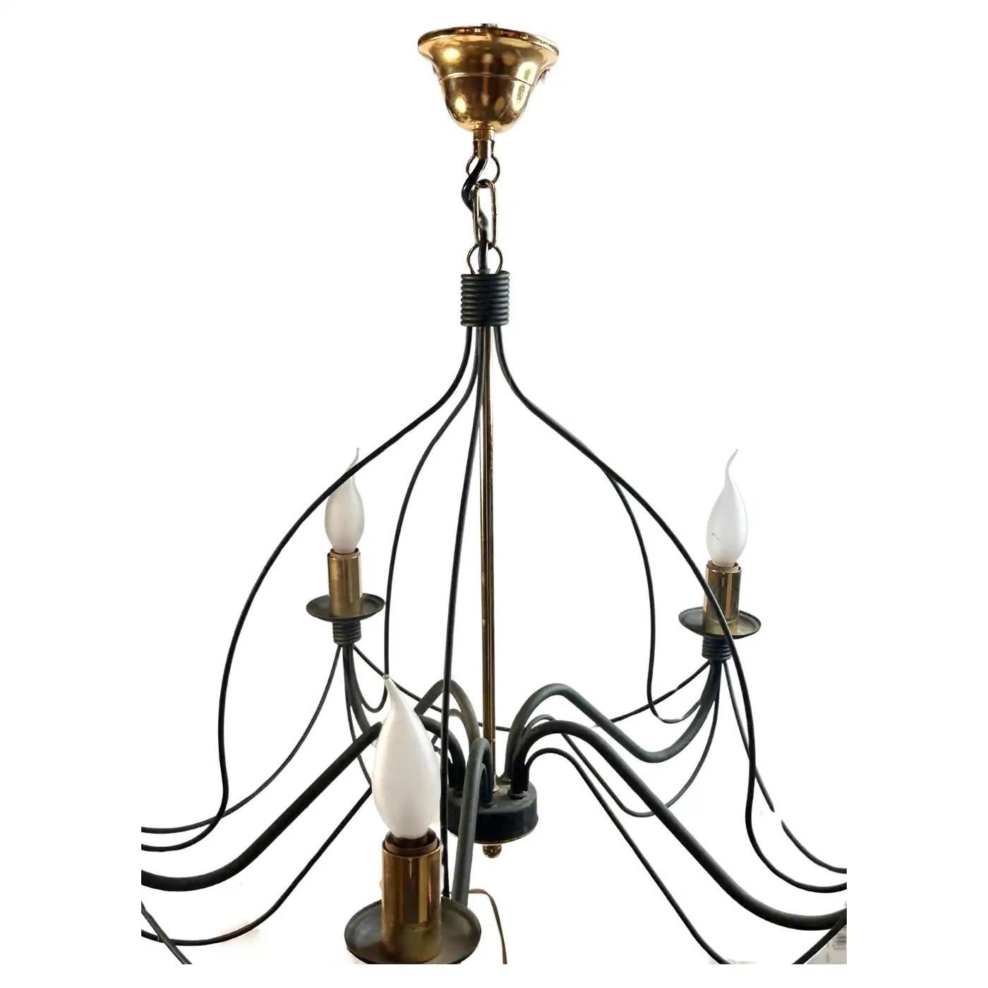 Elegant and classic chandelier finished in a verdigris look with brass accents. Functions as is with five E14 / 110 volt light bulbs. Can take up to 40 watts each bulb. Beautiful colored metal chandelier.
It gives the room a beautiful warm light and