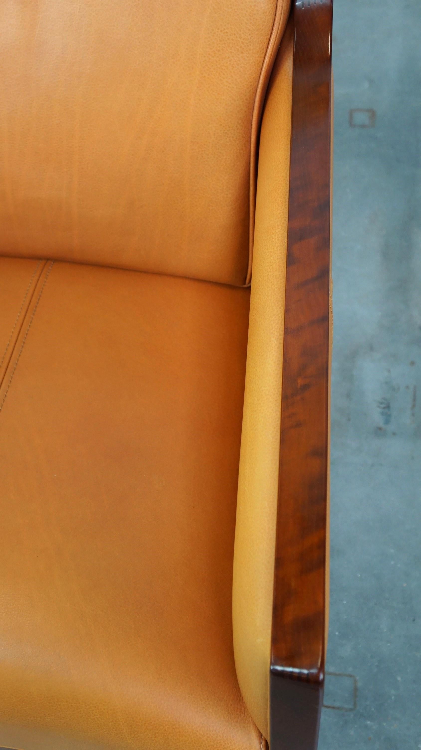 Beautiful cow leather Artdeco design armchair. High comfort and unique details For Sale 4