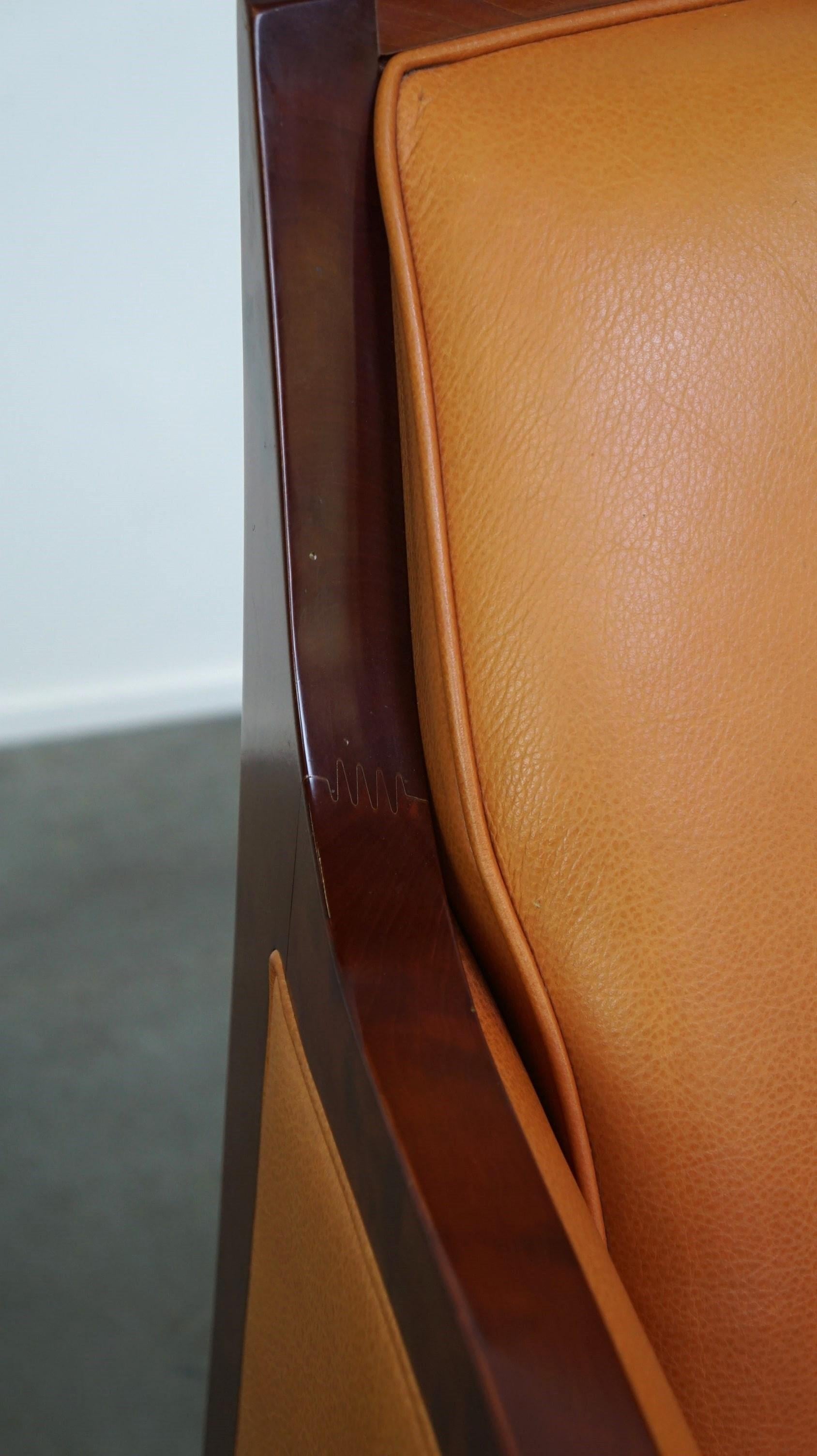 Beautiful cow leather Artdeco design armchair. High comfort and unique details For Sale 5