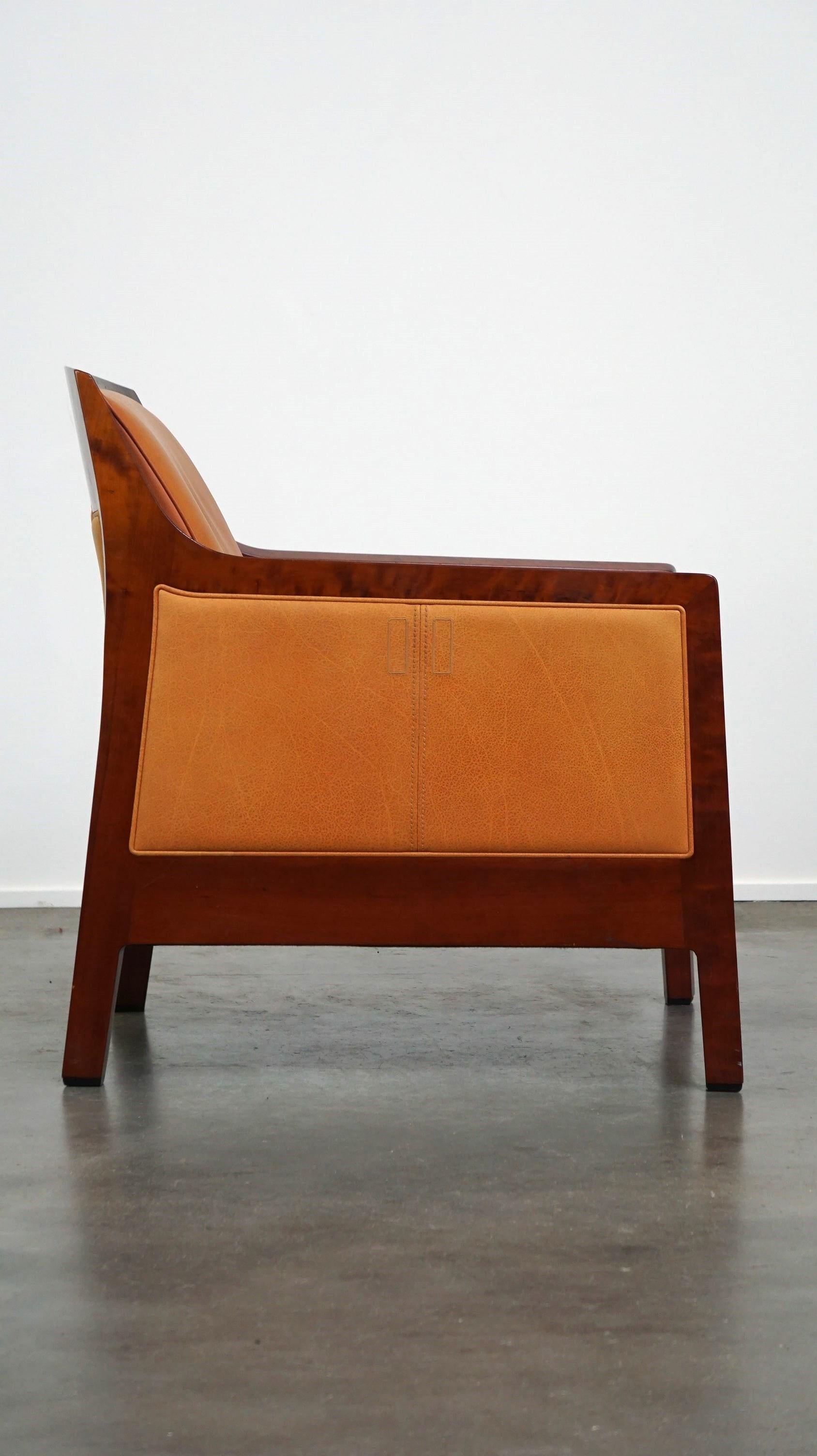 Contemporary Beautiful cow leather Artdeco design armchair. High comfort and unique details For Sale