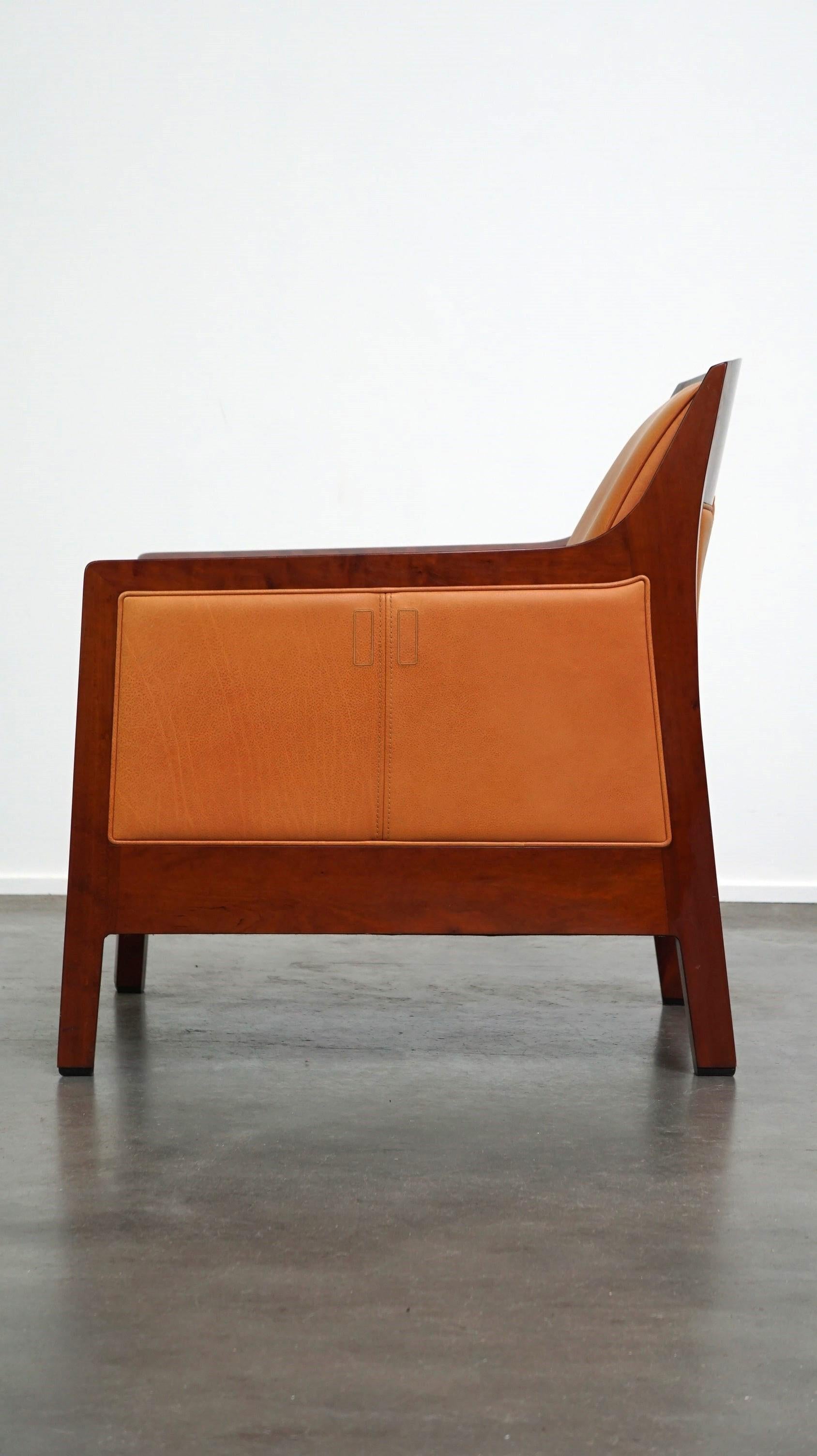Beautiful cow leather Artdeco design armchair. High comfort and unique details For Sale 1