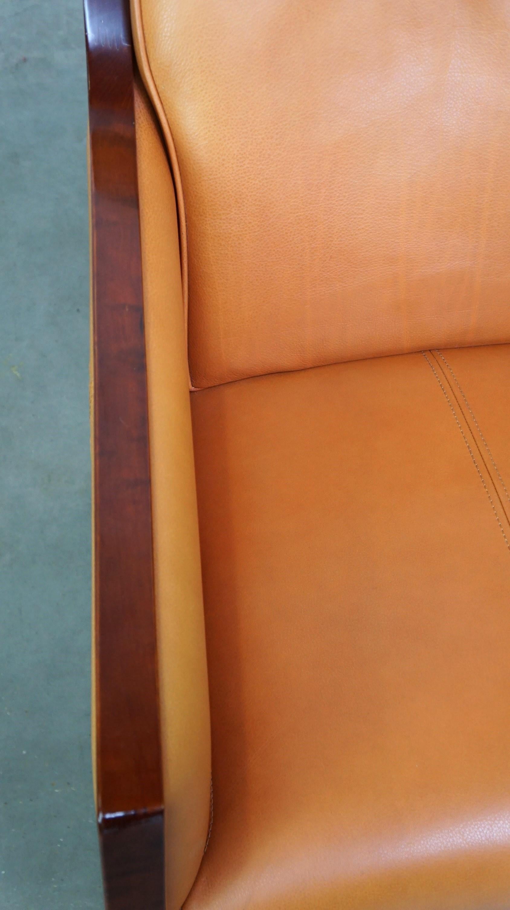 Beautiful cow leather Artdeco design armchair. High comfort and unique details For Sale 3
