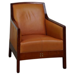 Beautiful cow leather Artdeco design armchair. High comfort and unique details