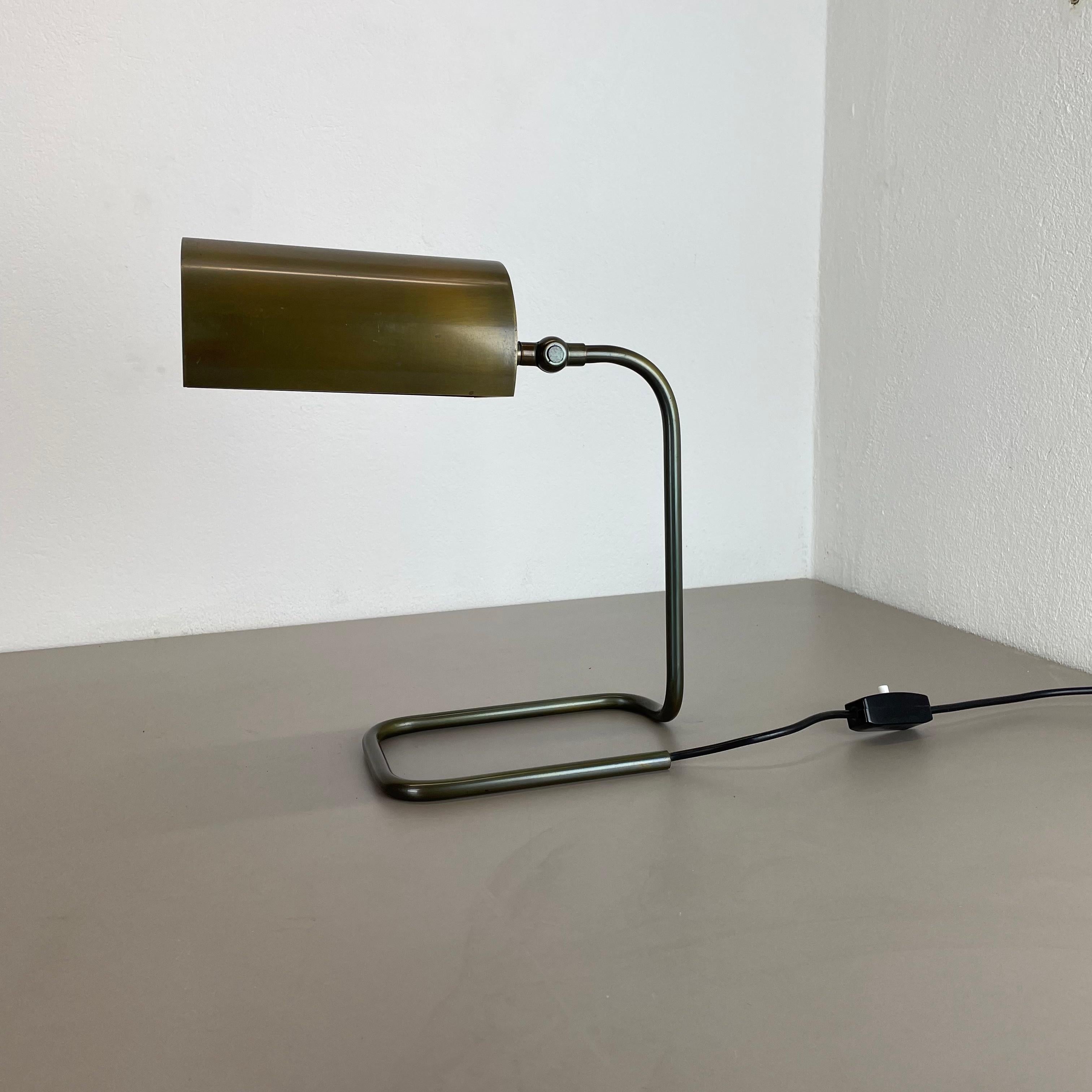 Article:

Table light


Origin:

Germany


Material:

Metal brass


Age:

1970s



Description:

This original vintage table light was designed and produced in Germany in the 1970s. This minimalist table light is made of solid