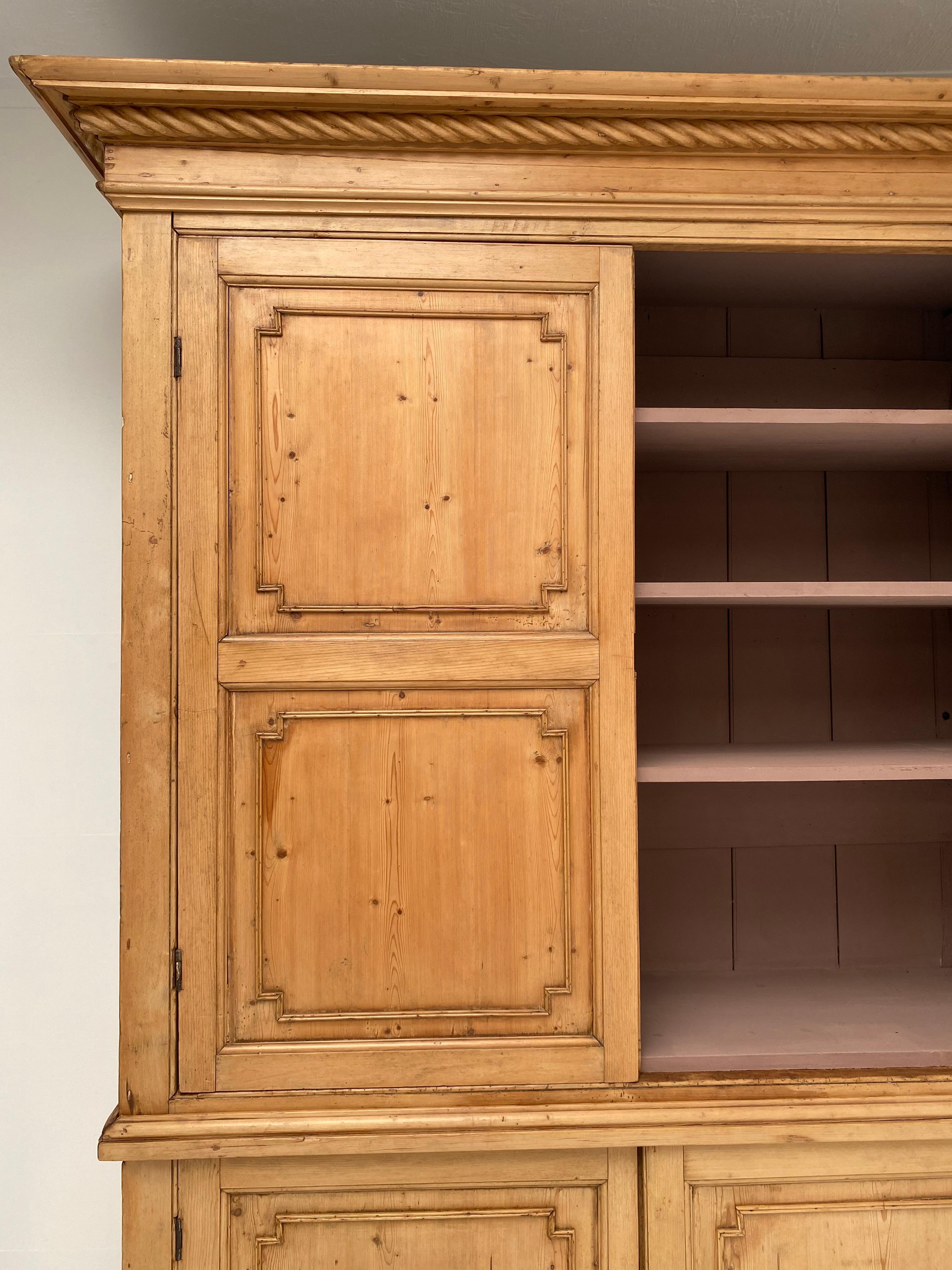 Impressive 4 doors, paneled Scottish kitchen cupboard,
the pine has a great old original finish,
the interior is new painted,
ideal to put in a kitchen,
great piece of furniture with a lot of character.