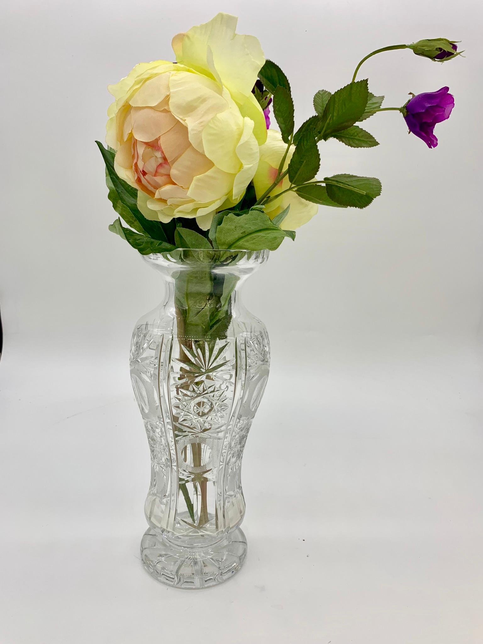 This stunning vase is a timeless all-rounder. Its crystal cut ornaments are elegant and beautiful craftsmanship,
circa 1930-1940.