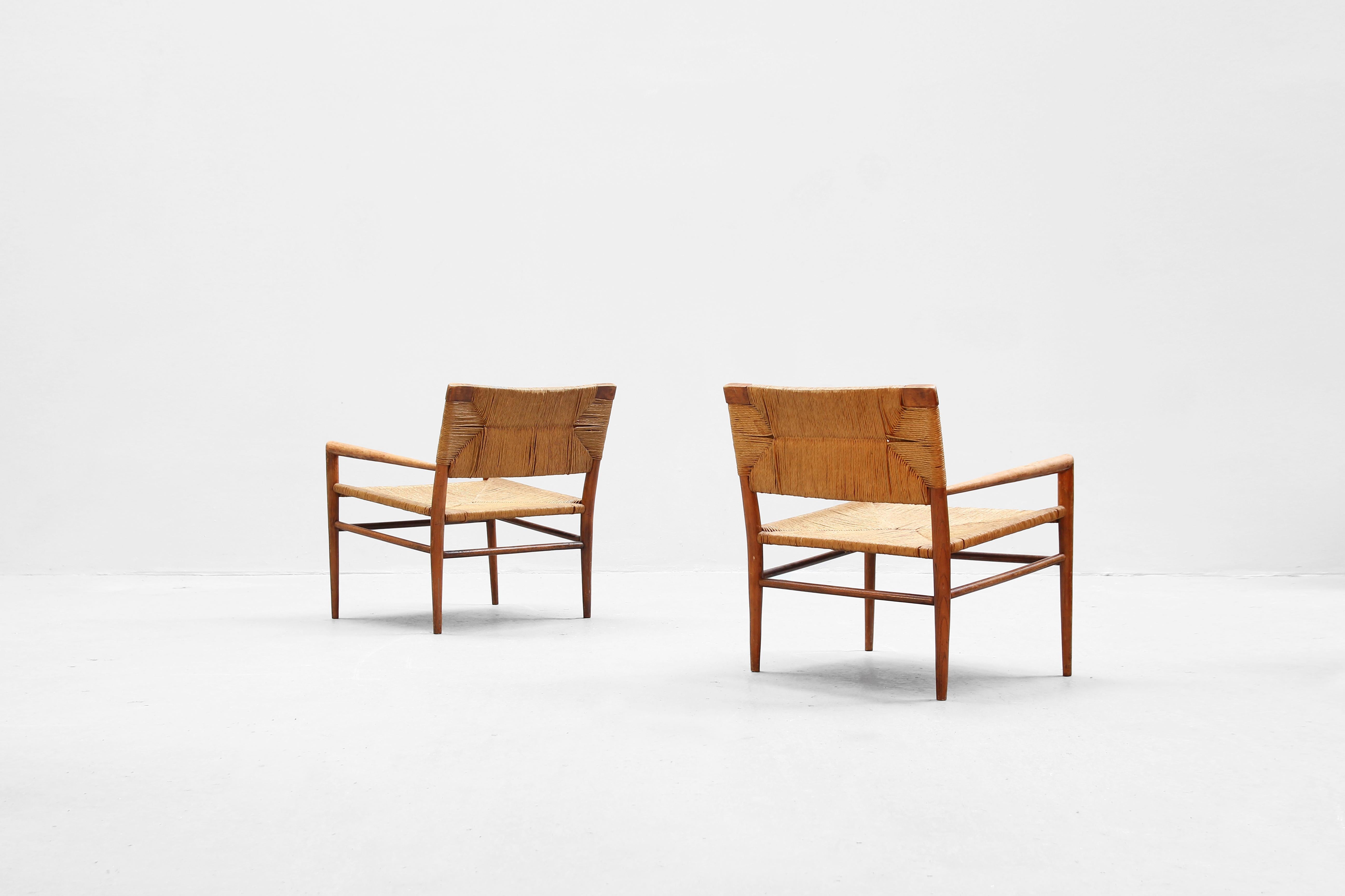 Very beautiful lounge chairs designed by Mel Smilow 1956 and made out of beech and cane, manufactured by Smilow-Thielle in the 1960. Both chairs are in a very good condition with traces of usage and beautiful patinated cane and beech frame.
