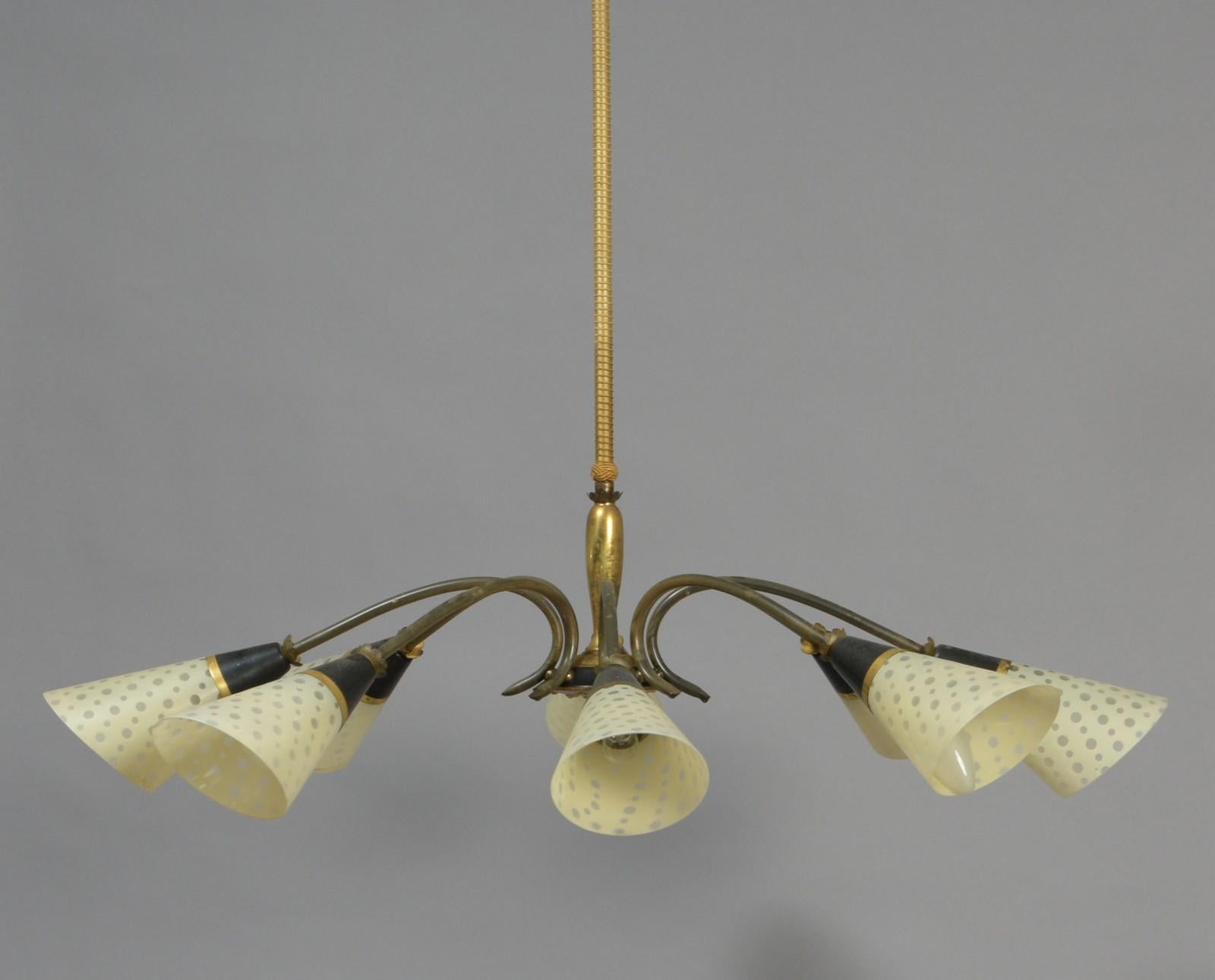 Brass frame with opaline glass shades cone form, made in Denmark in the late 1950s.
