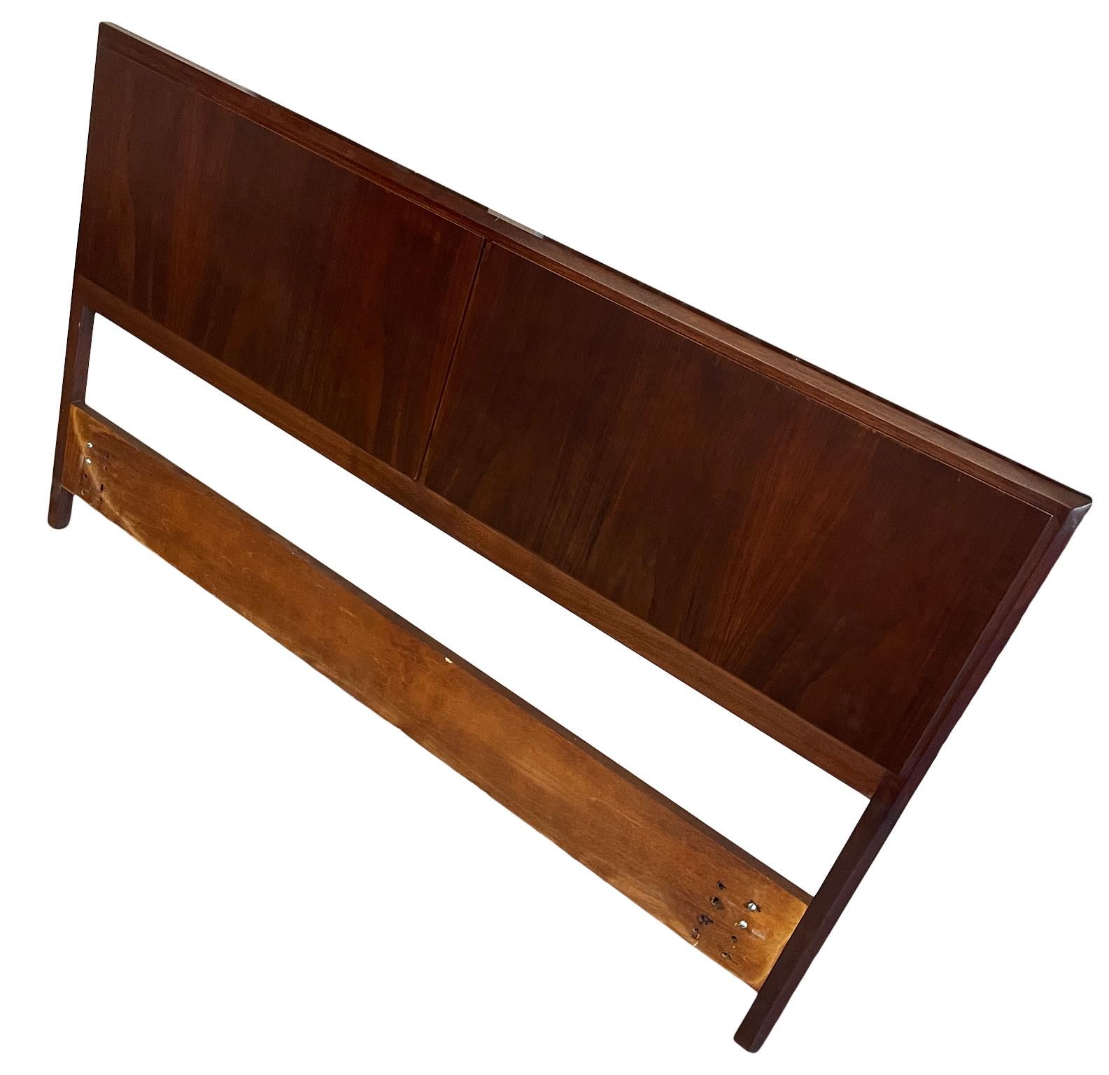 Beautiful Danish Mid-Century Modern Queen headboard made in Denmark in wonderful condition. Really nice Rosewood headboard with solid wood details. Fits a Queen sized mattress. Bed headboard only no metal bed frame. Easily mounts to all bed