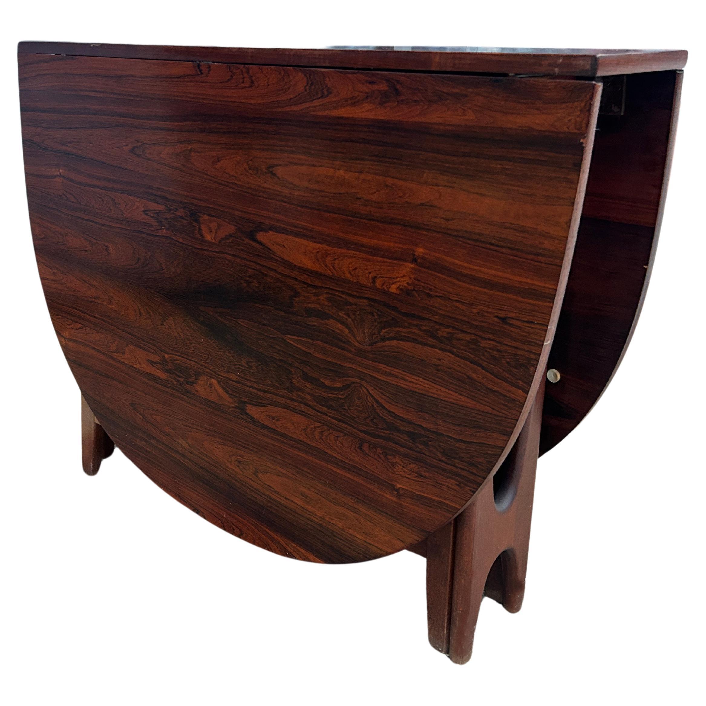 Woodwork Beautiful Danish modern rosewood oval folding drop leaf dining table For Sale
