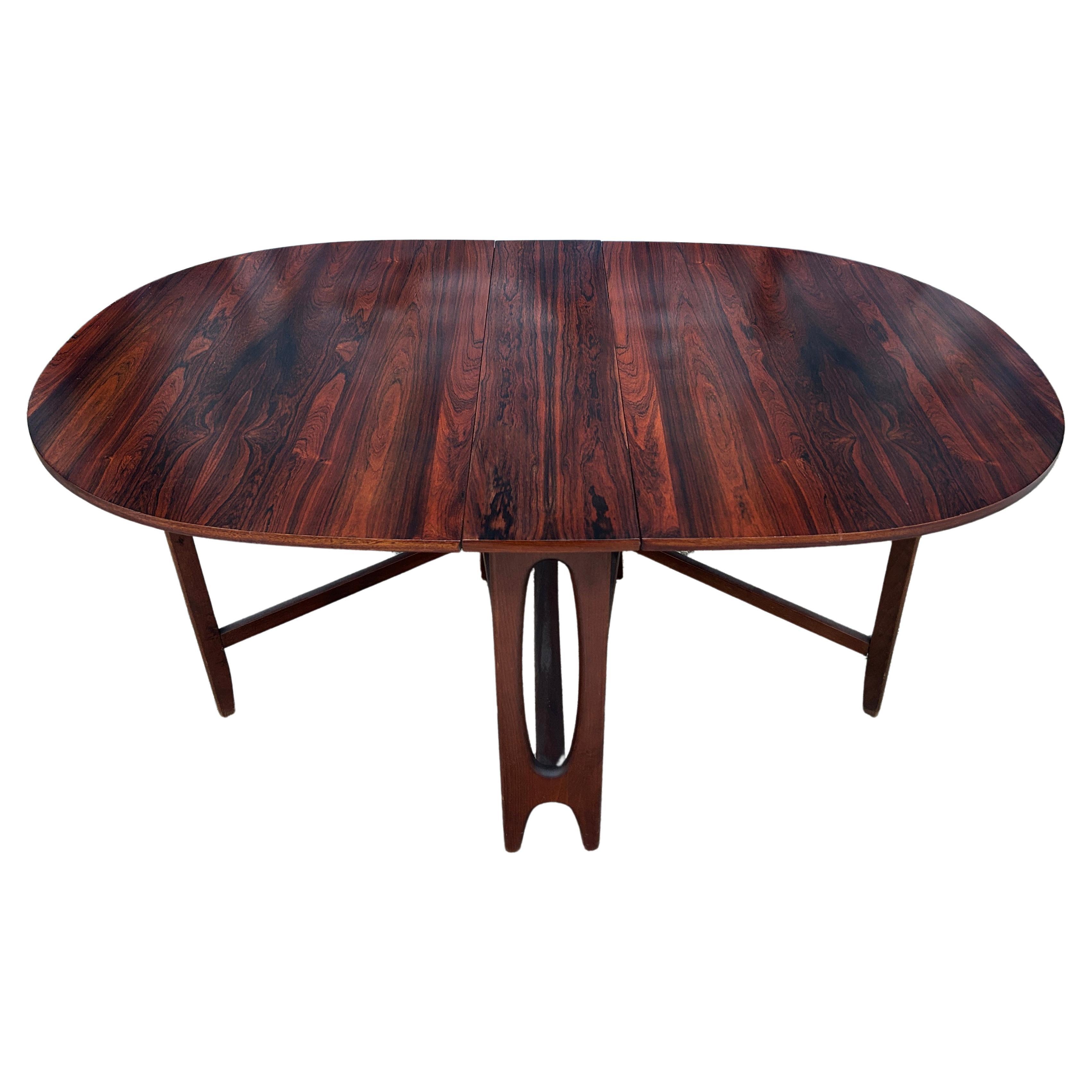 Beautiful Danish modern rosewood oval folding drop leaf dining table 