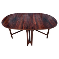Vintage Beautiful Danish modern rosewood oval folding drop leaf dining table 