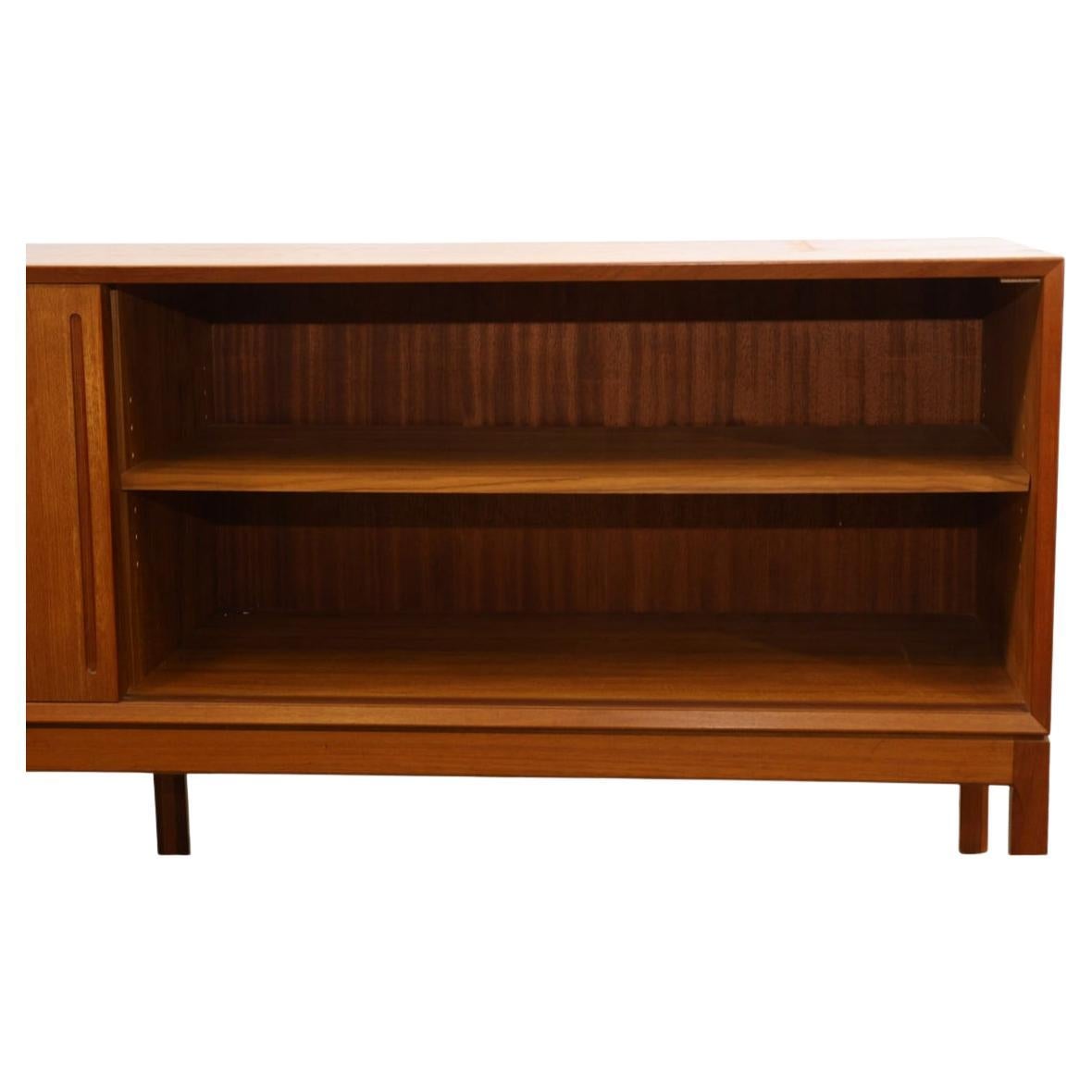 Woodwork Beautiful Danish modern teak credenza with sliding doors by Aksel Kjersgaard For Sale
