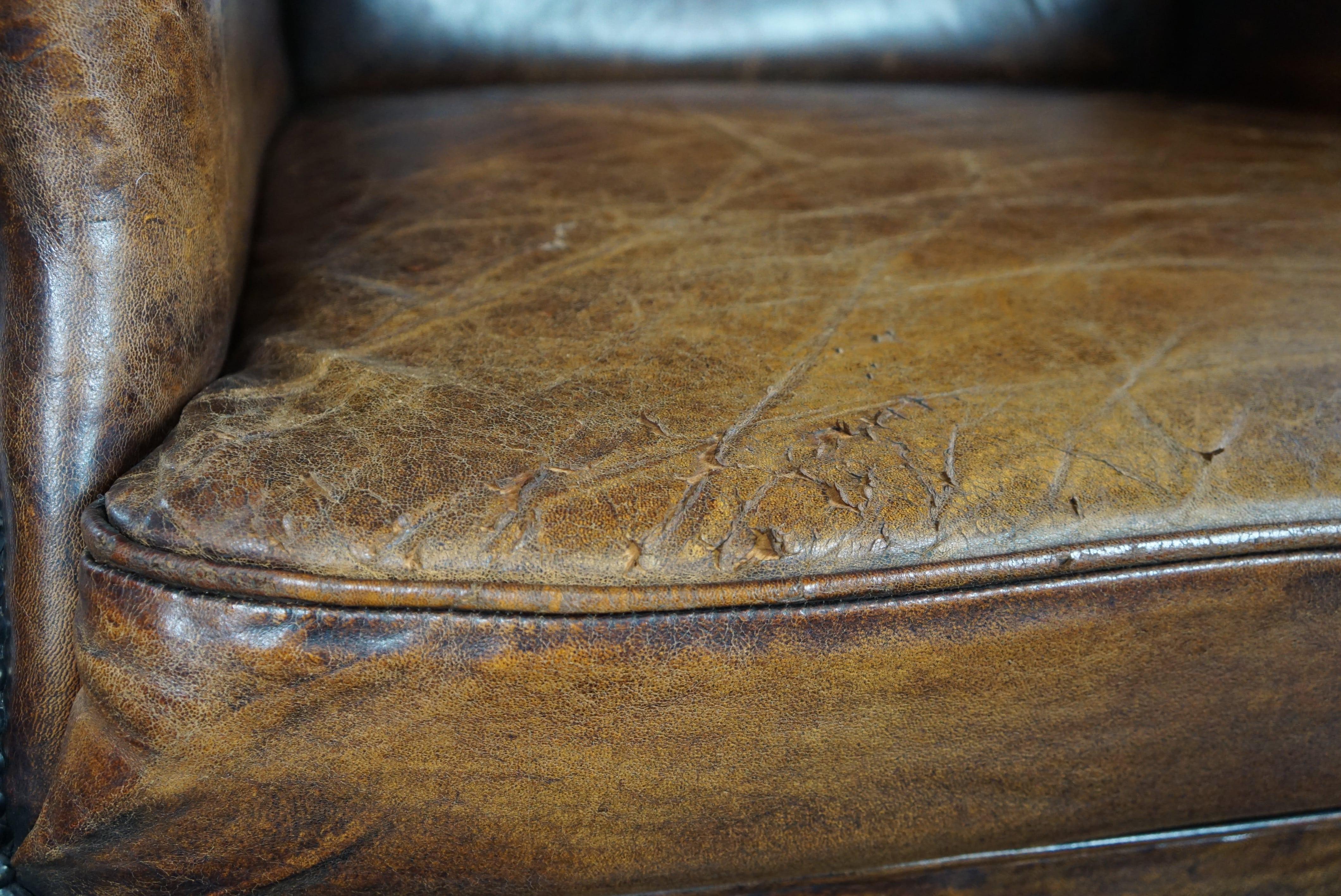 Beautiful dark wing chair made of sheep leather with beautiful colors For Sale 3