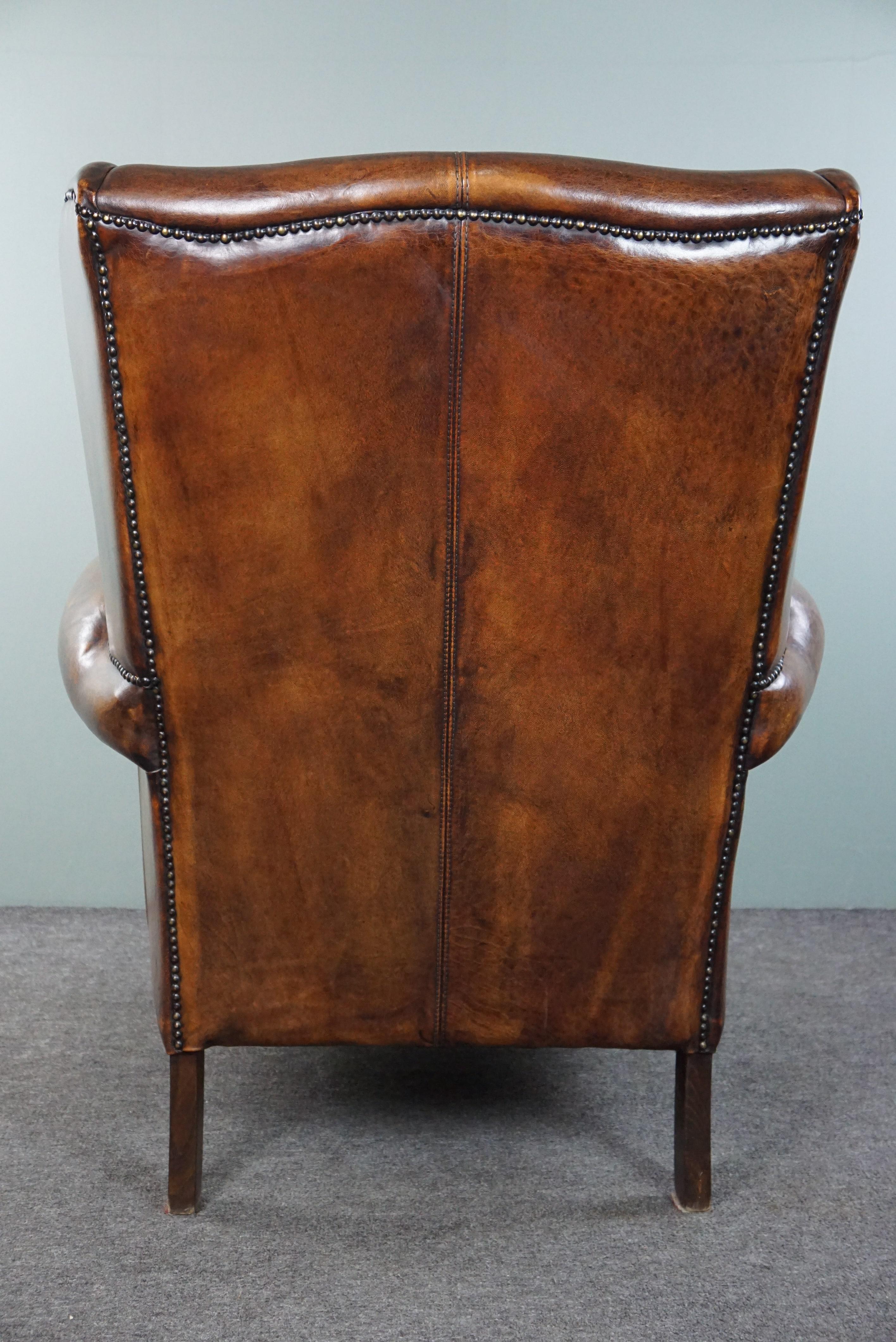 Beautiful dark wing chair made of sheep leather with beautiful colors In Good Condition For Sale In Harderwijk, NL