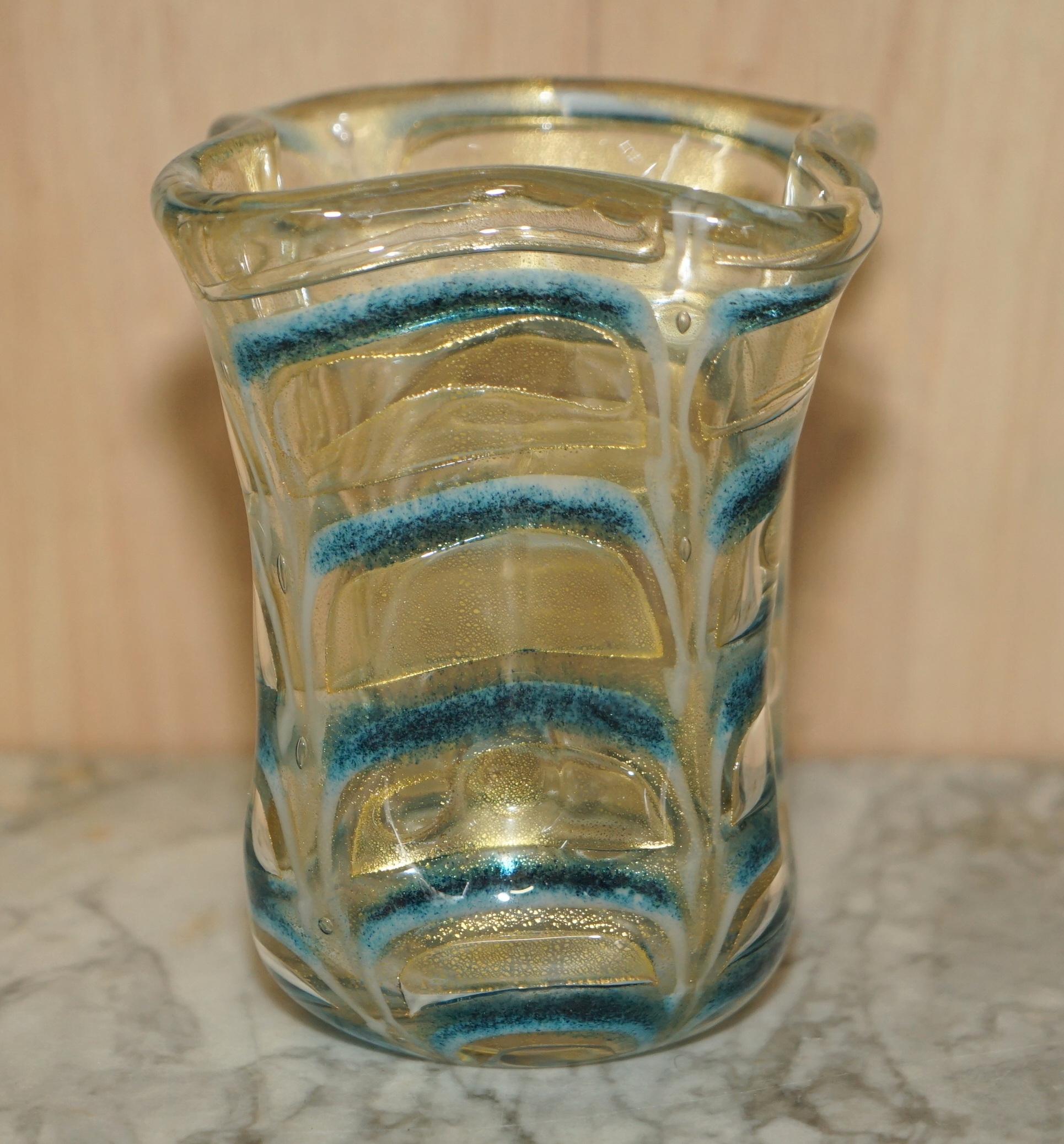We are delighted to offer for sale this stunning one of a kind decorative crimped glass vase.

This piece looks sublime from every angle, it doesn’t have any damage that I can see, it is very decorative.

Dimensions

Height:- 15.5cm

Width:-