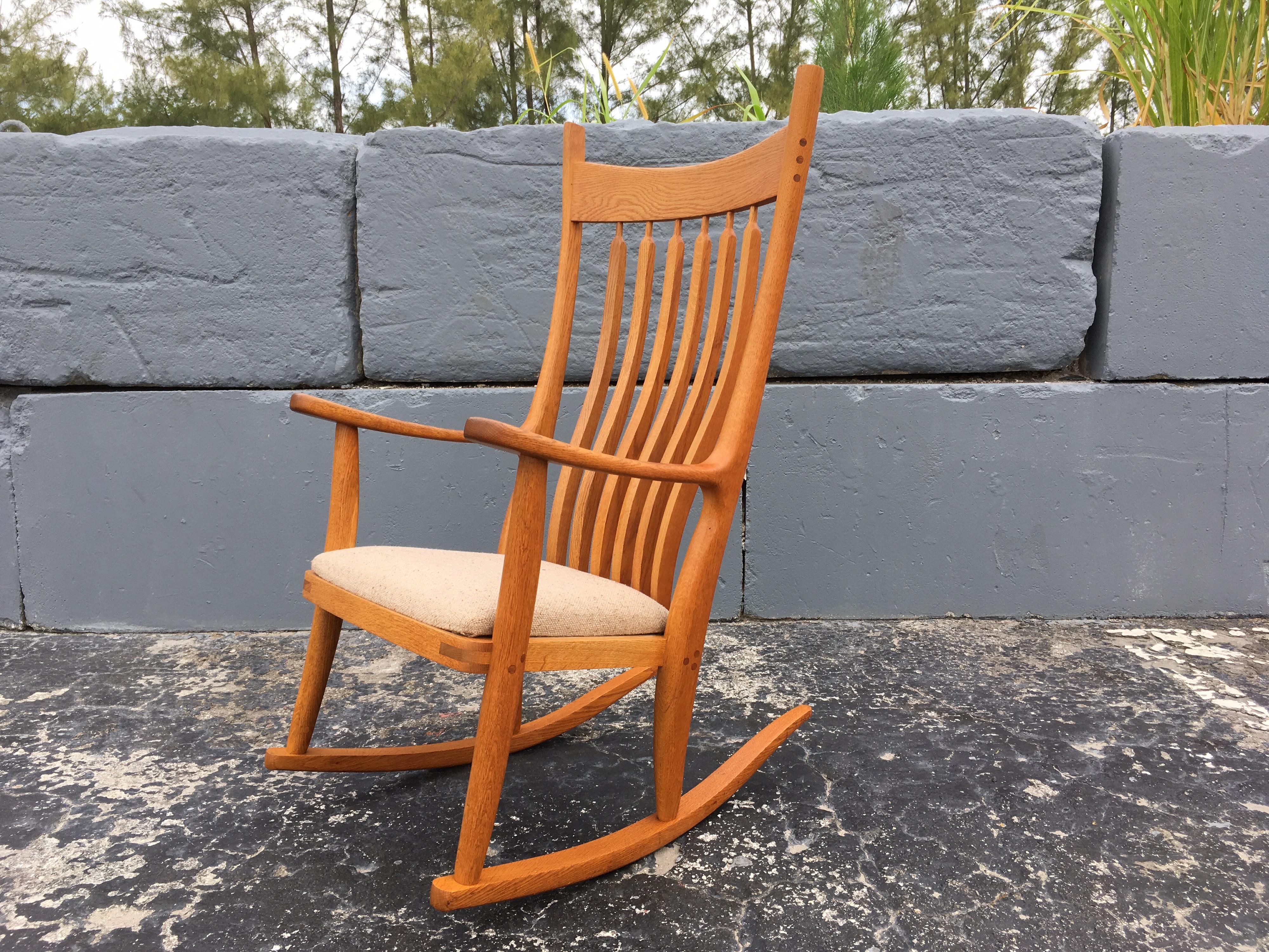 Beautiful piece of furniture and very comfortable. White oak rocking chair with fabric seat.