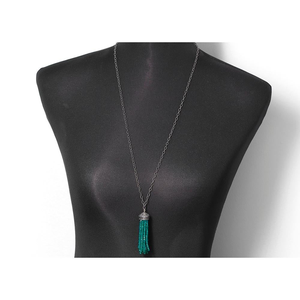 Beautiful Diamond and Silver Tassel Necklace -  This  necklace features a diamond and silver tassel with several emerald bead strands. Sterling silver chain measures apx. 32-inches in length and and  tassel measures apx. 2-1/2 inches in length.
