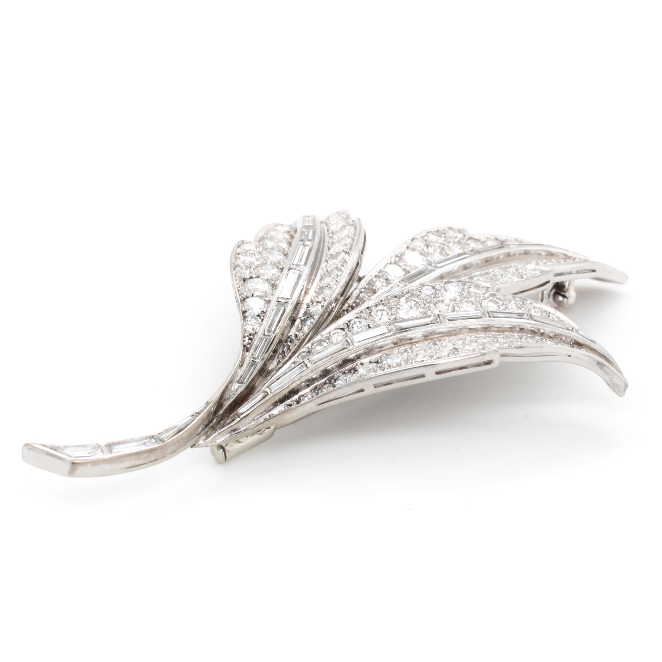A stunning three leaves diamond brooch made in the classic Art Deco style. 
The brooch is set with 89 round and brilliant cut diamonds of approx. 2.4ct and 31 baguette and trapeze cut diamonds of approx. 3ct (H-I/VVS-VS). 
It is beautifully crafted