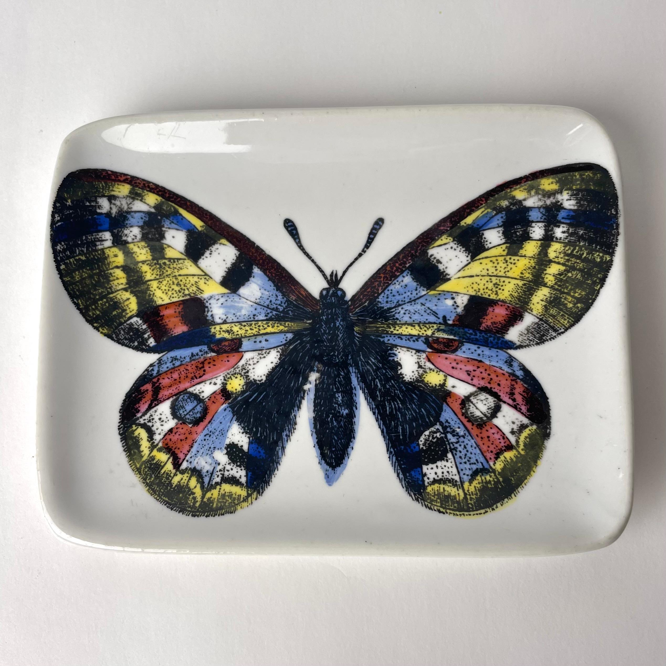 A Beautiful dish with a Butterfly in porcelain designed by Piero Fornasetti during the Mid-20th Century. Typical Fornasetti design and with a butterfly with beauful colors

Wear consistent with age and use 