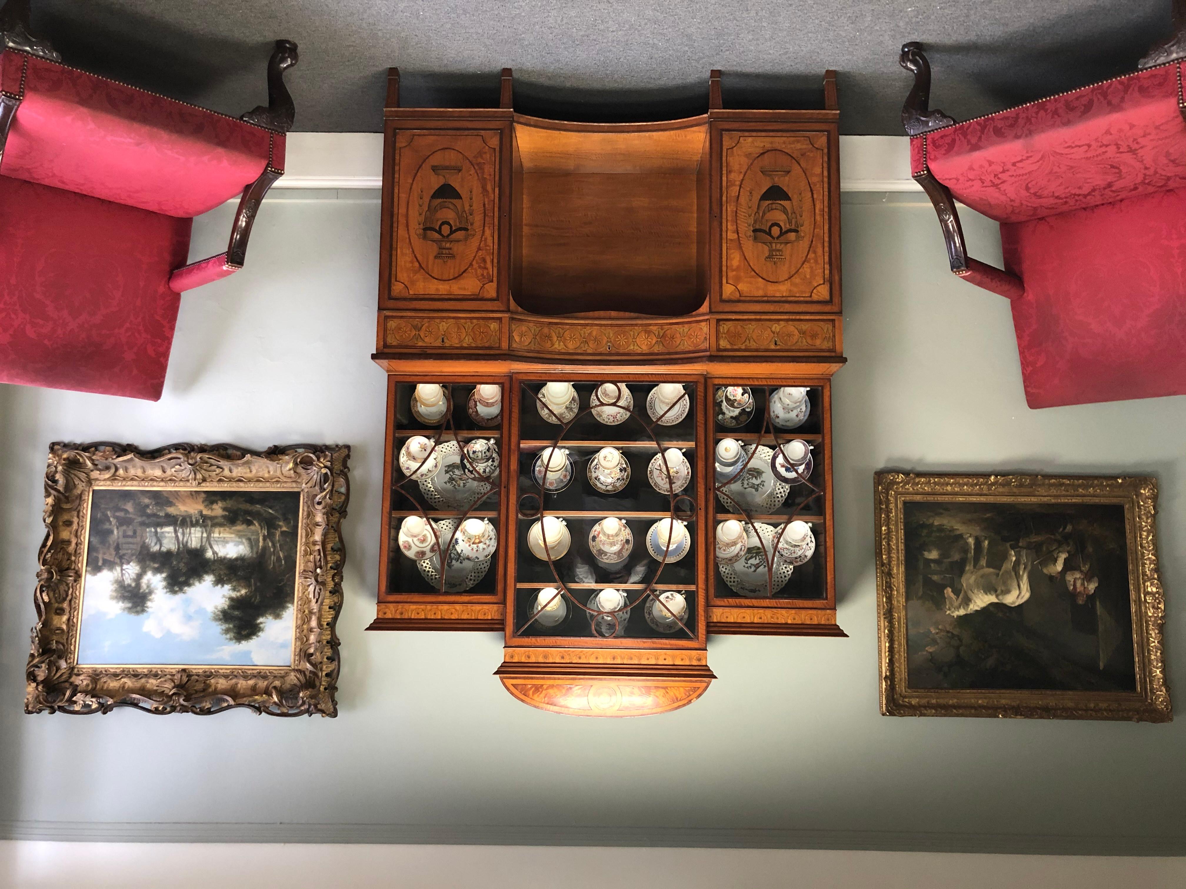 Beautiful display cabinet in the style of Mayhew and Ince
Around 1800 in date, extremely finely inlaid with detailed fruitwood, brilliant craftsmanship more than likely made in bond st.
Excellent condition considering its date.