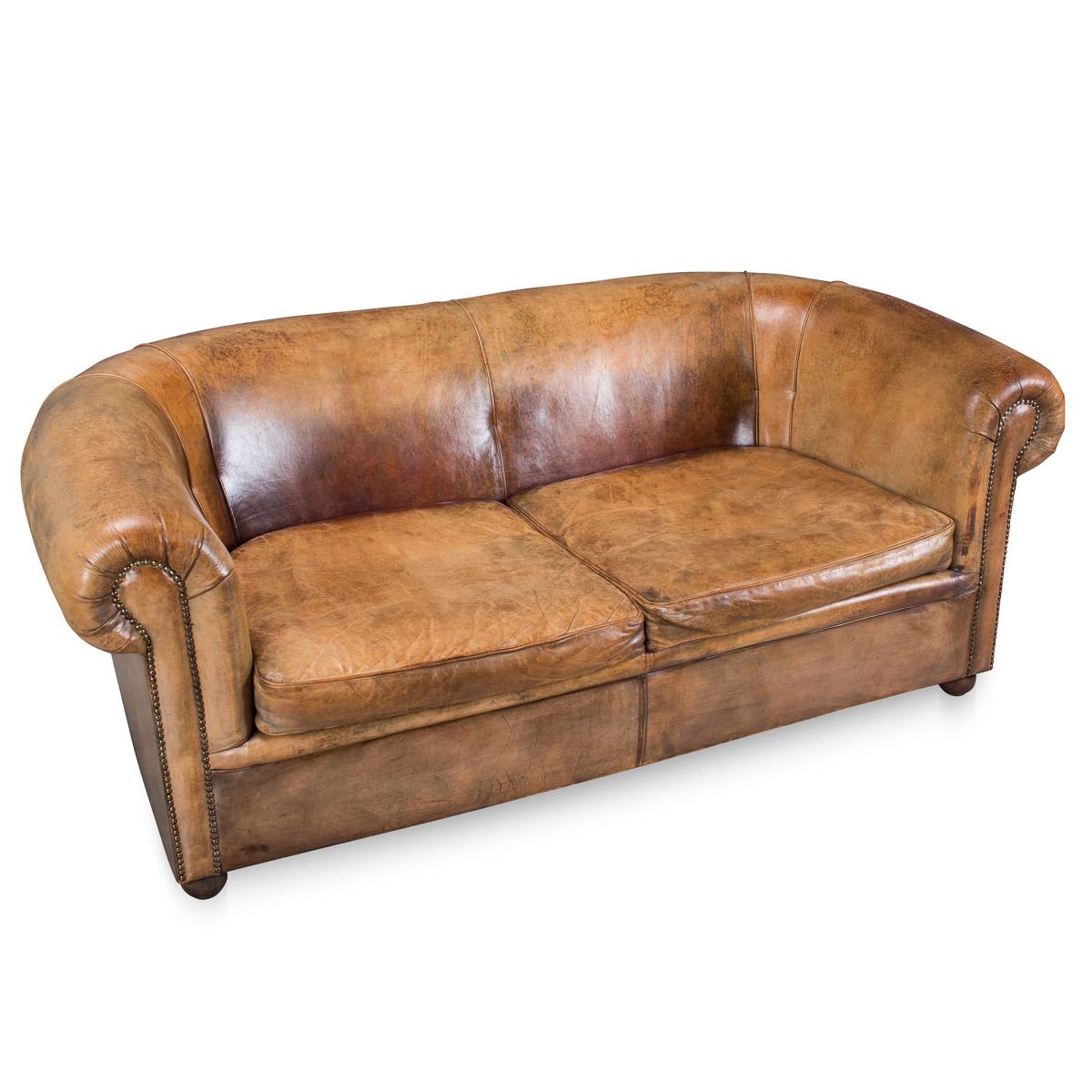 Wonderful leather two-seat sofa in rich tan leather, north European (probably Belgium or Holland), mid to late 20th century.
Condition:

Some wear to the cushions, otherwise excellent.


Size:

Height 70 cm
Width 175 cm
Depth 80 cm.

 