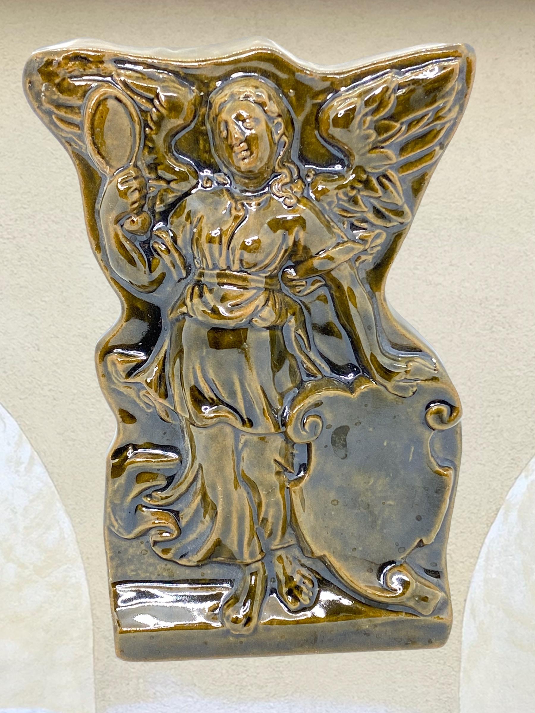 This beautiful wall plaque was made in Vienna Austria. It shows the archangel Gabriel. Nice addition to your wall or just to display. It has no chips, cracks or repairs.