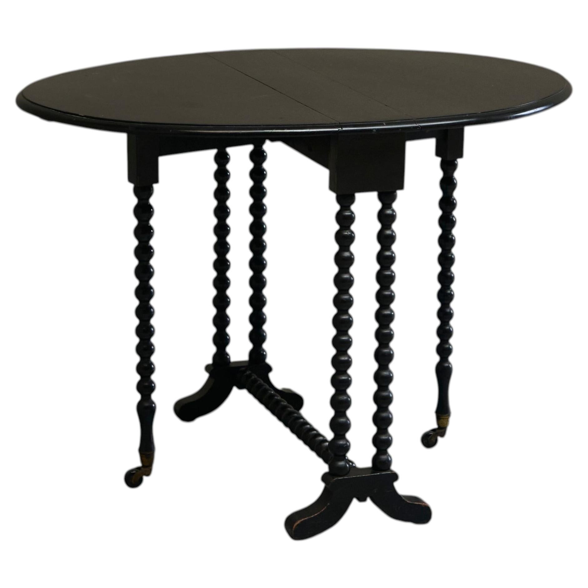 Magnifique table Sutherland ébonisée et tournée aux fuseaux, Angleterre, fin du 19e siècle
