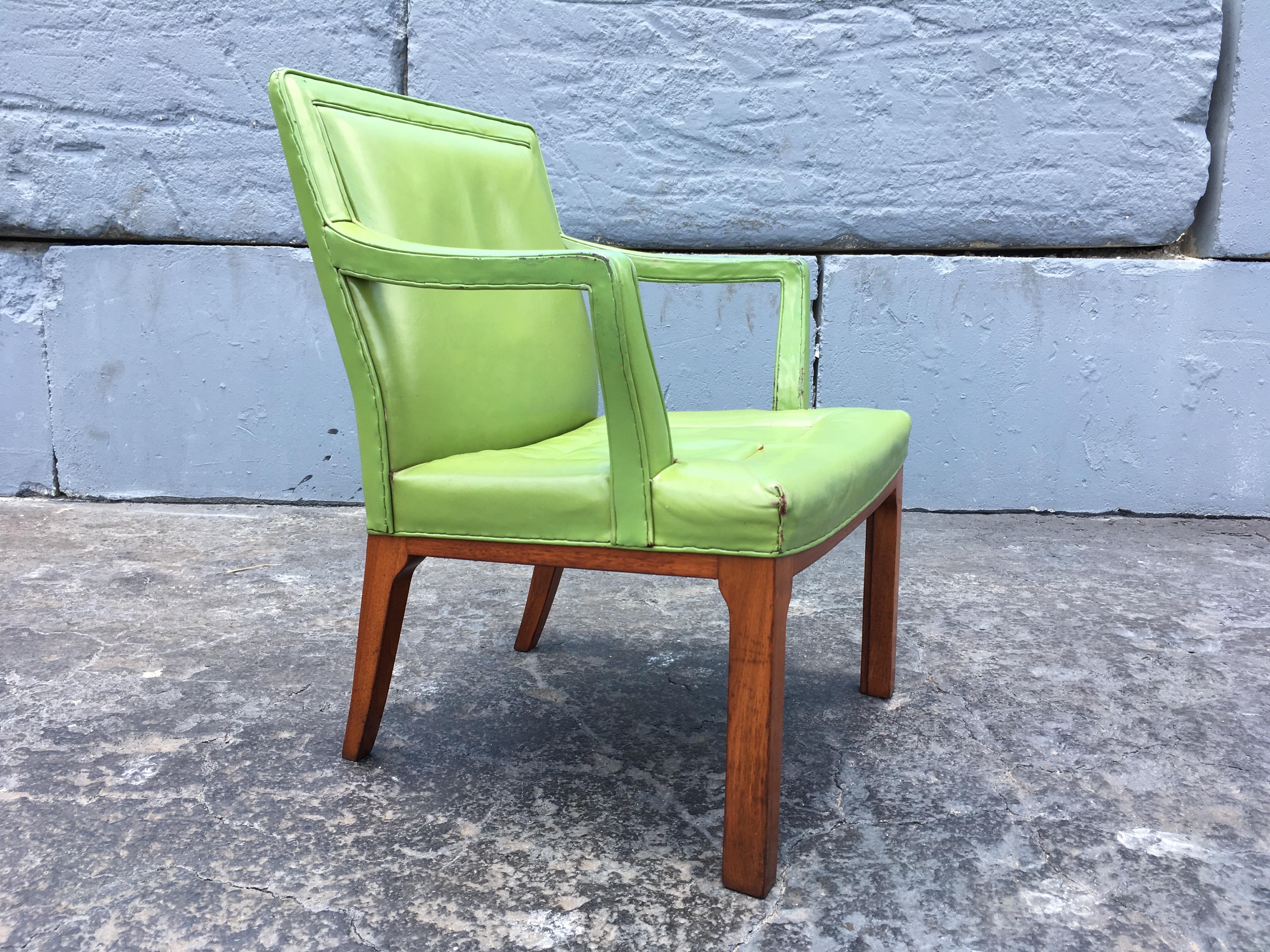 Rare green leather chair by Edward Wormley for Dunbar. Leather has some damages.