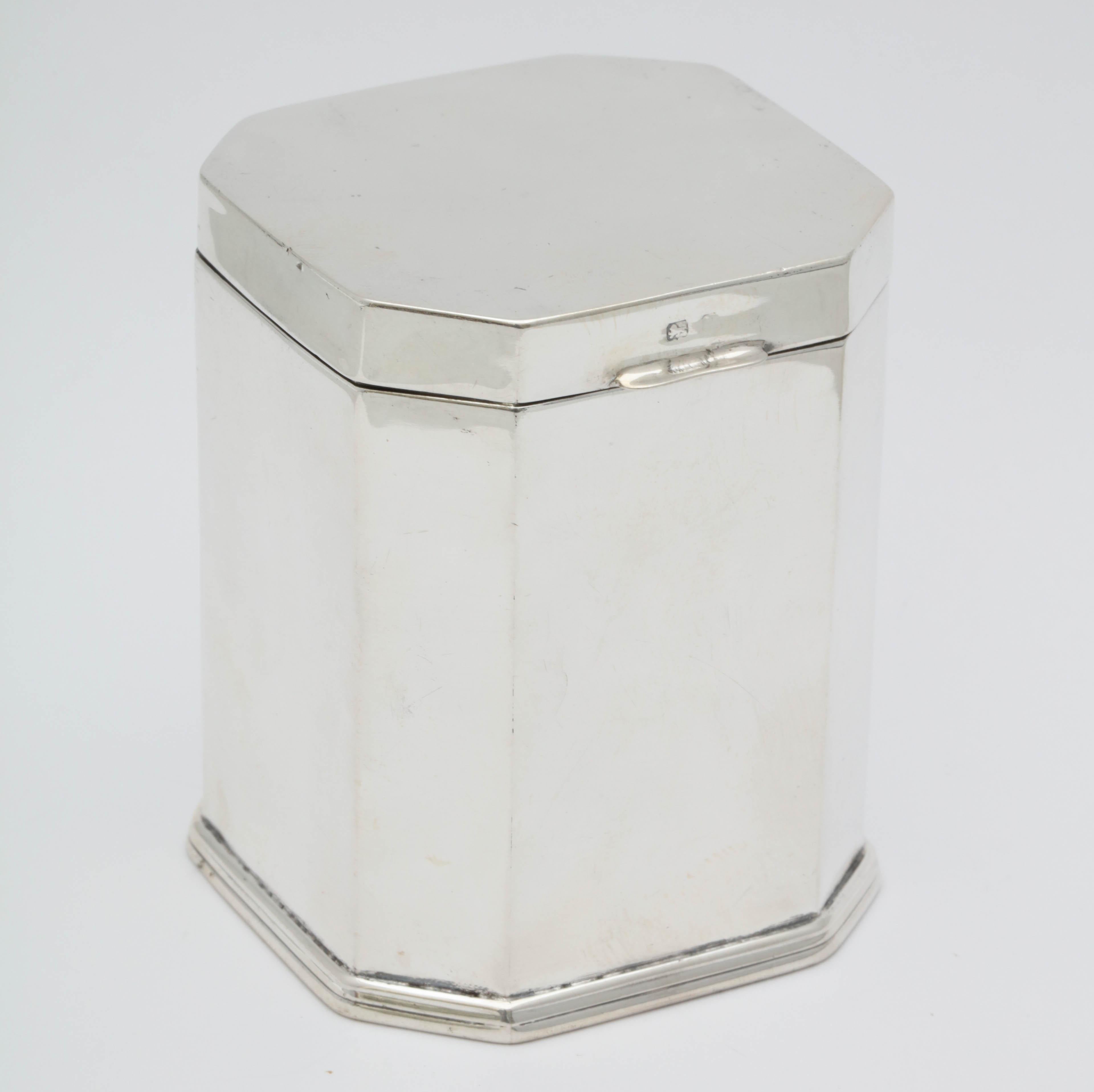 Beautiful, Edwardian, sterling silver, octagonal tea caddy with hinged lid, Birmingham, England, 1907, Levi and Salamon - makers. Measures over 2 3/4 inches high x 2 1/2 inches deep x 2 1/2 inches wide. Interior is gilded. A very small bit of
